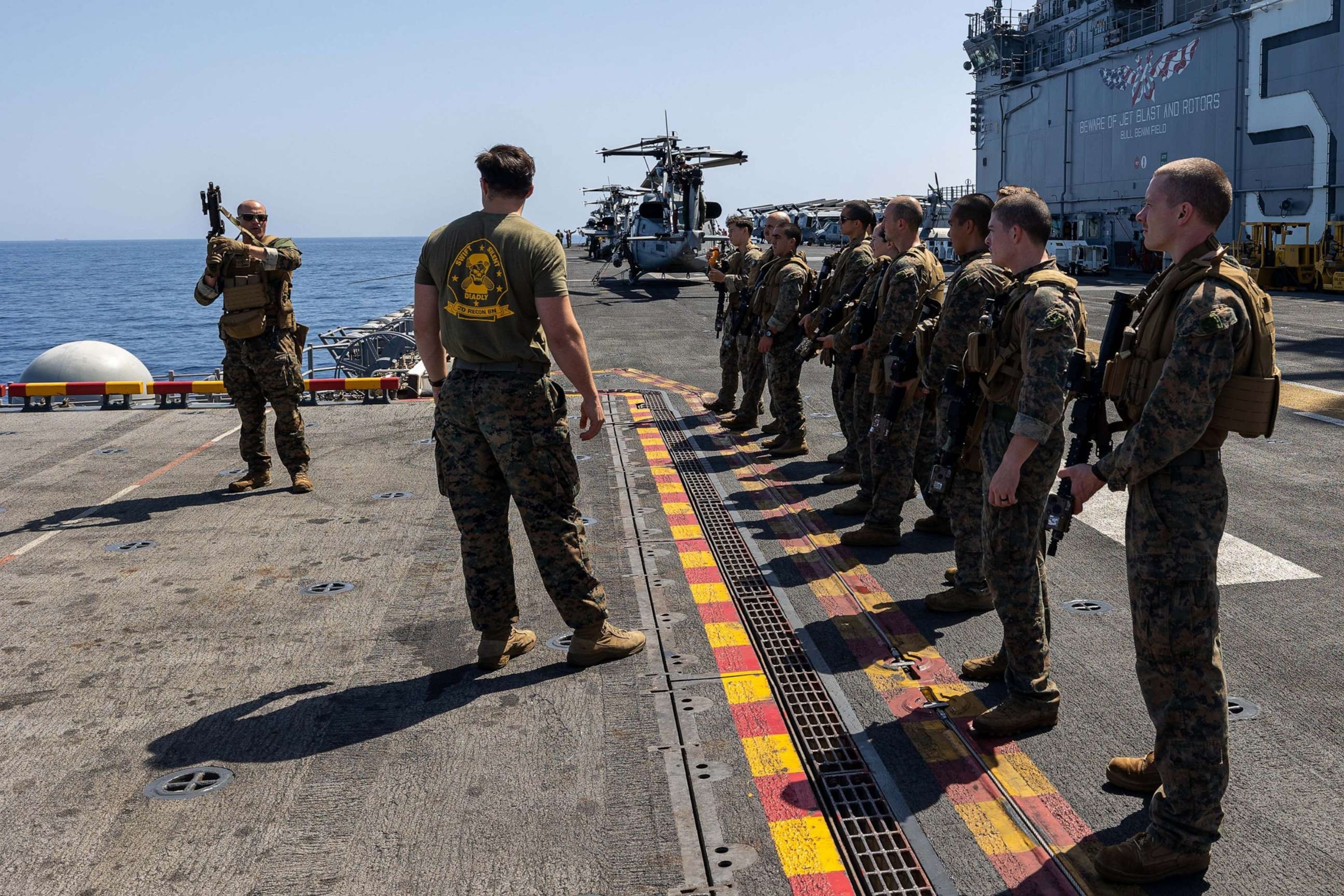 PHOTO: Maritime Special Purpose Force Marines, assigned to the 26th Marine Expeditionary Unit Special Operations Capable on the flight deck of the USS Bataan in the Mediterranean Sea, July 26, 2023.