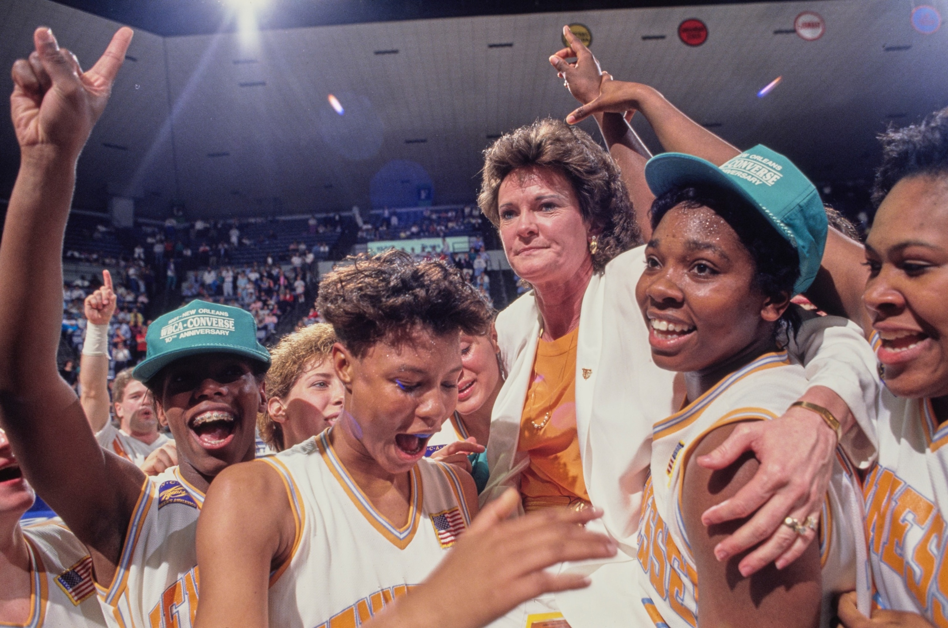 PHOTO: Pat Summitt, Head Coach for the Tennessee Lady Volunteers celebrates with the team after winning the NCAA Division I Women's Basketball Tournament Final Four Championship, March 31, 1991, at the Lakefront Arena in New Orleans.