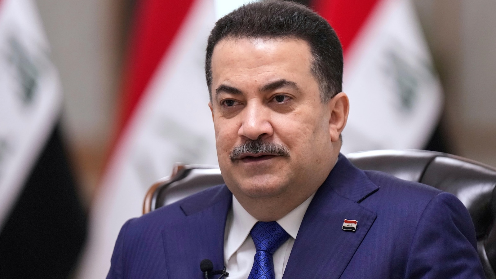 Iraqi prime minister removes paramilitary commanders after deadly clash with police