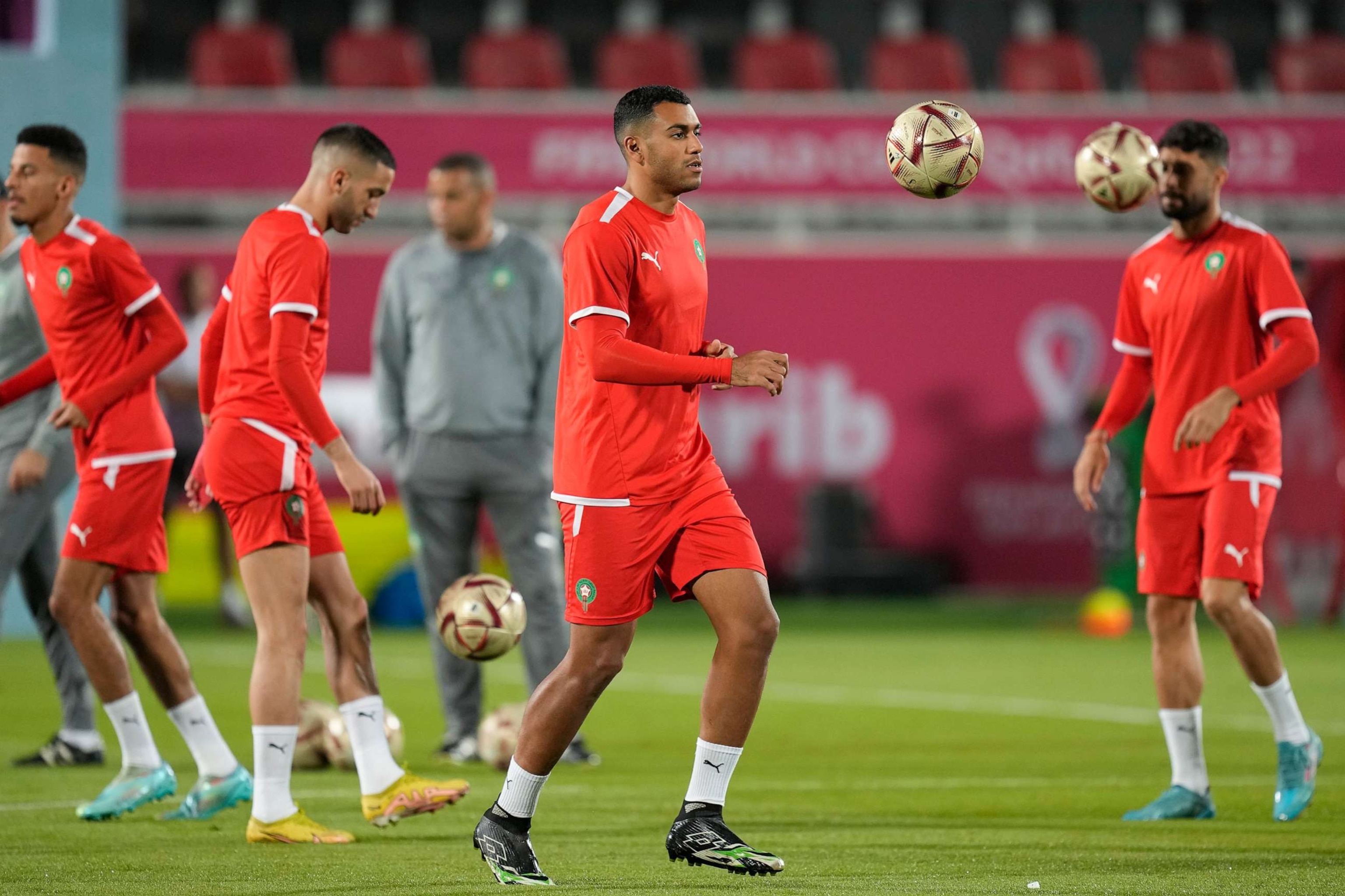 PHOTO: Morocco's Walid Cheddira, center, and teammates practice during a training session at the Duhail Stadium in Doha, Qatar, Dec. 13, 2022.