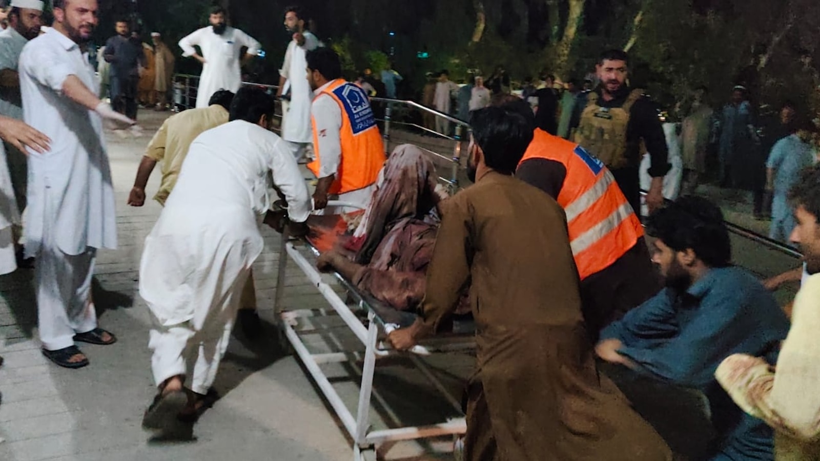 Twin attacks by militants kill 3 police officers, wound 20 in restive northwest Pakistan