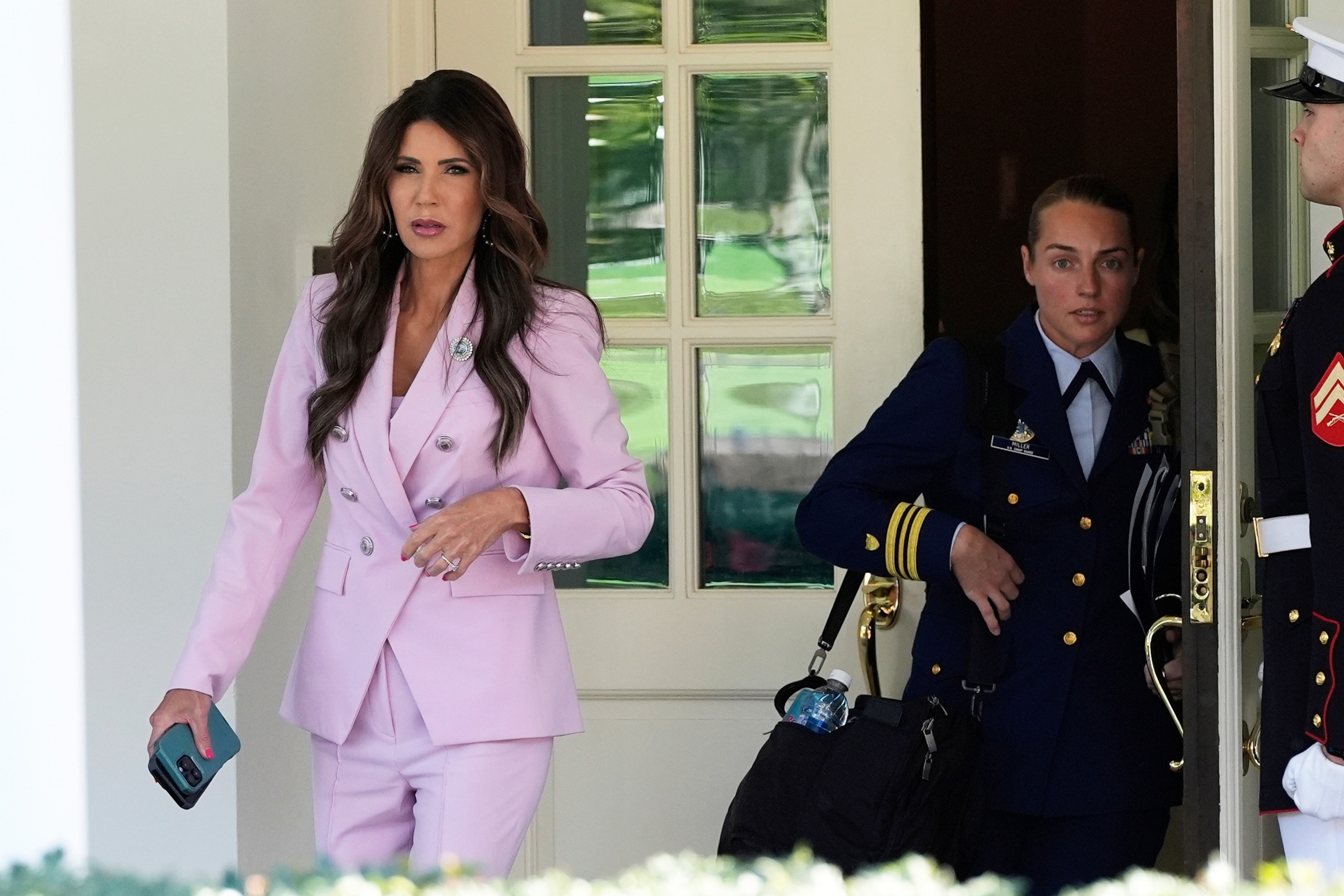 PHOTO: In this Aug. 26, 2025, file photo, Homeland Security Secretary Kristi Noem walks from the West Wing of the White House,  in Washington, D.C., to do a television interview. 