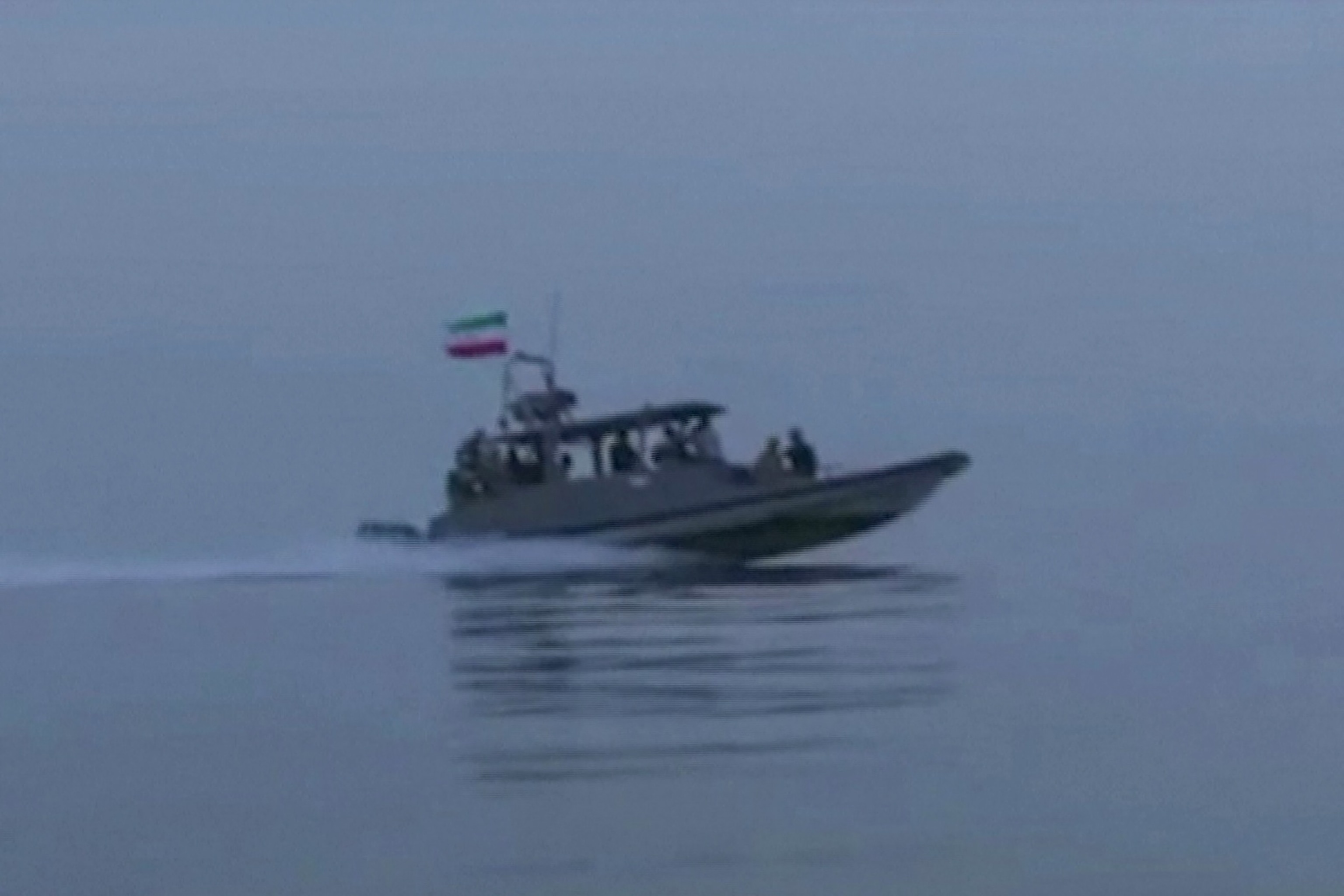 PHOTO: This screen grab taken from a video released by Iran's IRGC and made available via Iran's state broadcaster on April 23, 2026, shows an IRGC boat allegedly taking part in an operation to seize ships attempting to cross the Strait of Hormuz.