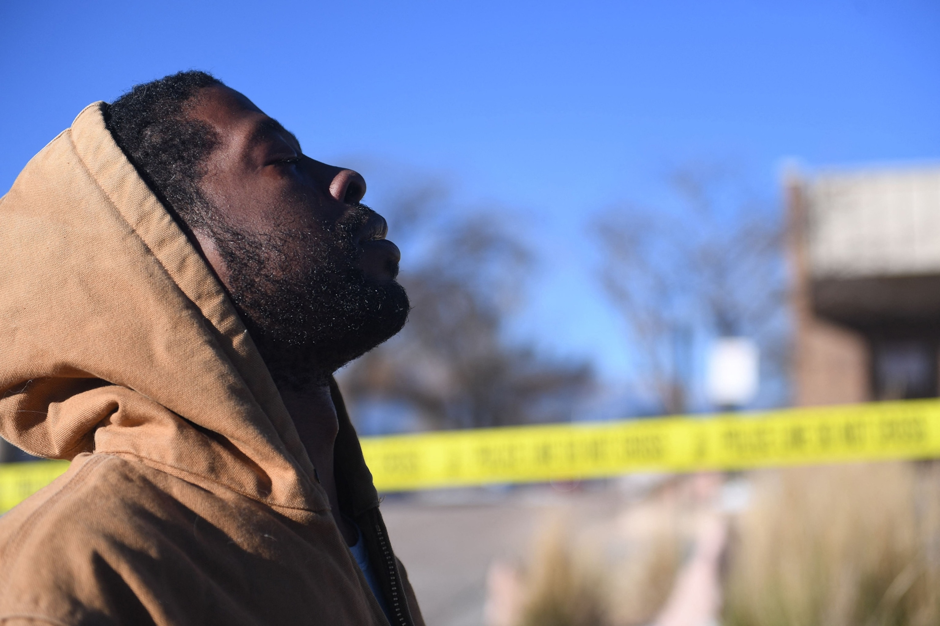 PHOTO: Joshua Thurman, of Colorado Springs, reacts the morning after a mass shooting at Club Q, an LGBTQ nightclub in Colorado Springs, Colo., Nov. 20, 2022.