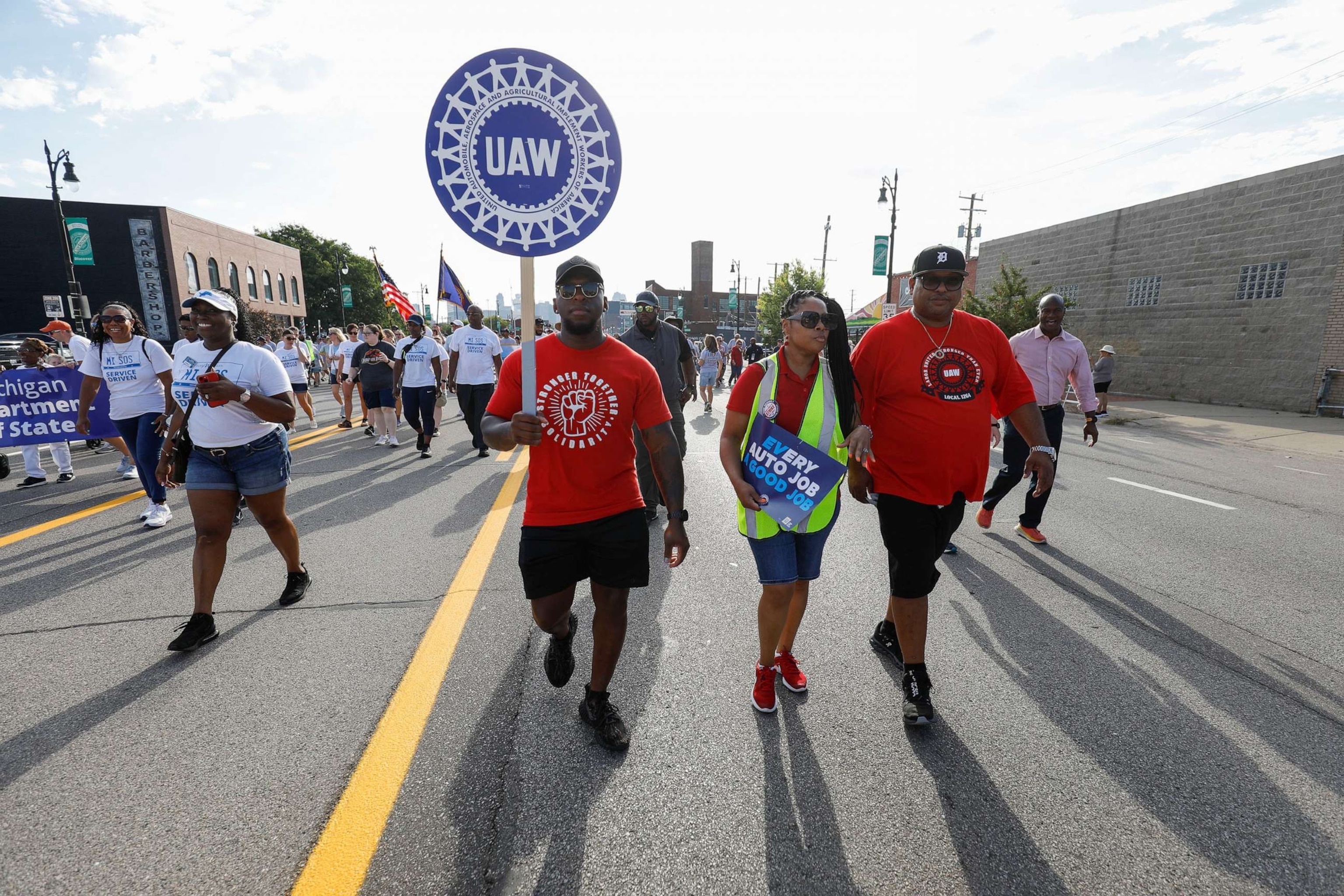 PHOTO: United Auto Workers members march in the Detroit Labor Day Parade on Sept. 4, 2023, in Detroit, Mich.