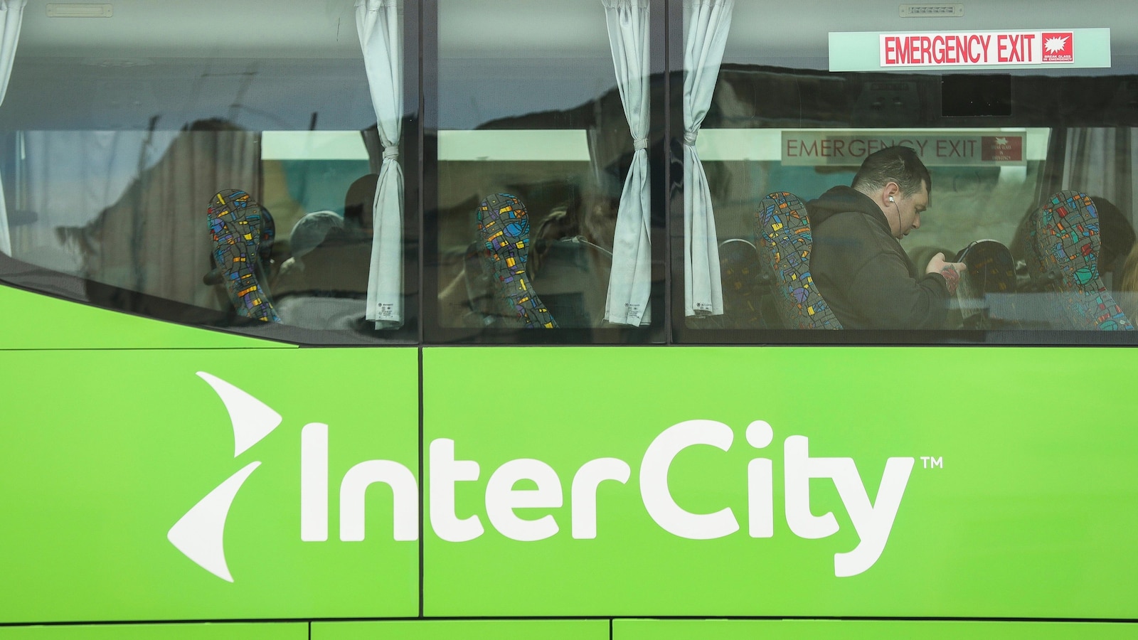 New Zealand woman arrested after 2-year-old girl found alive in suitcase stowed in bus luggage
