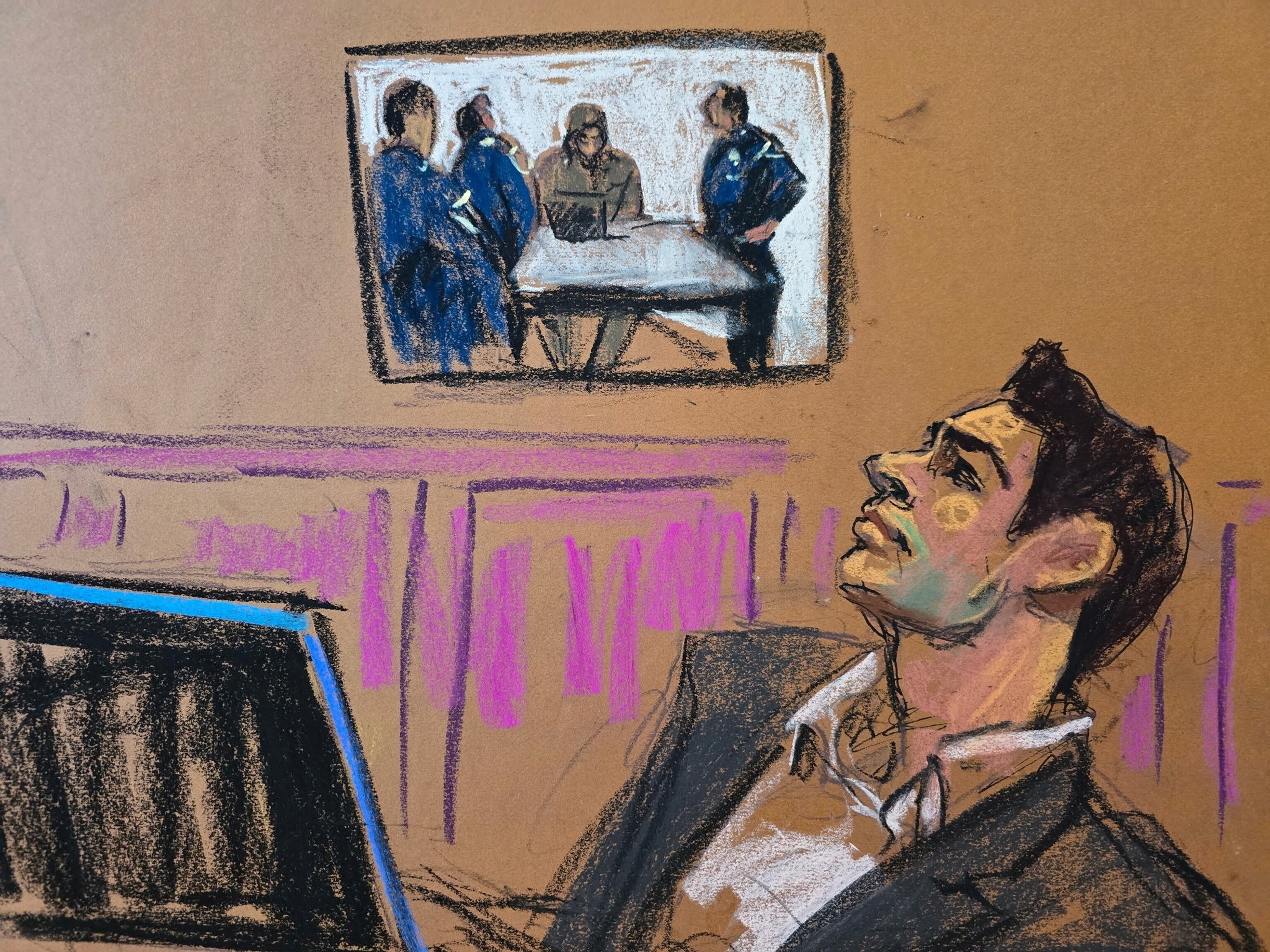 PHOTO: Luigi Mangione watches video of himself speaking with police in a McDonald's restaurant shown during state court hearings over whether prosecutors can use his police statements at his murder trial in New York City, Dec. 1, 2025.