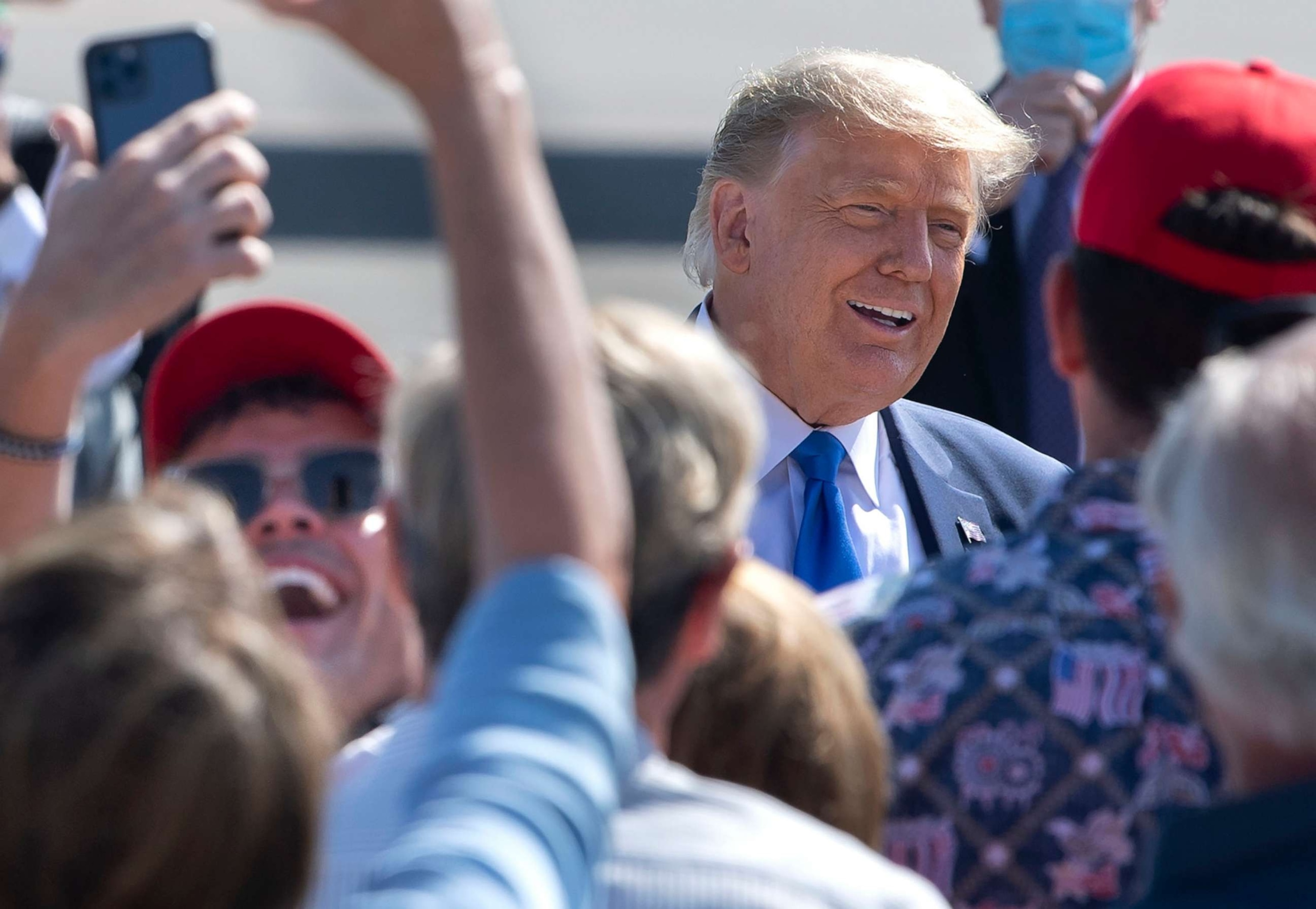 PHOTO: Trump supporters with special clearance greet President Trump as he lands at John Wayne Airport in Santa Ana on"nSunday, Oct. 18, 2020.