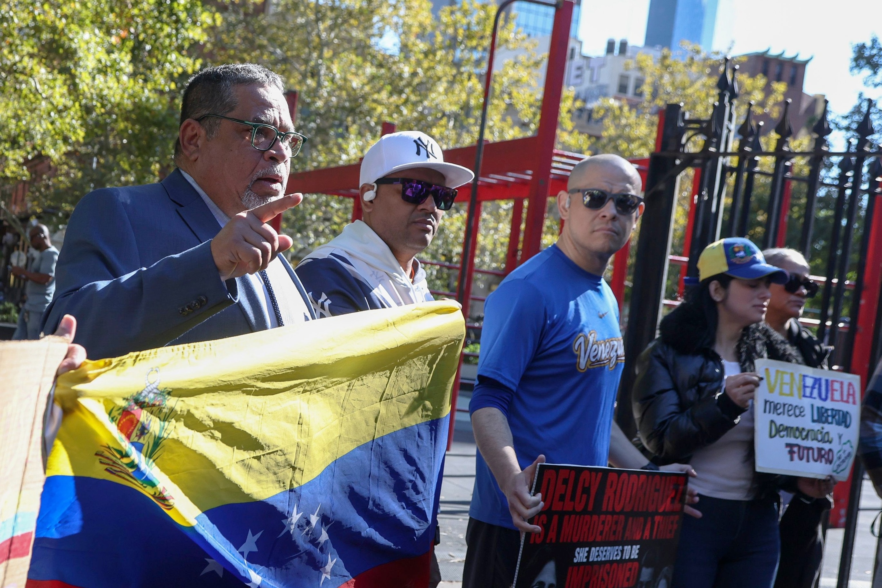 PHOTO: People protest against former Venezuelan President Nicolas Maduro and his wife Cilia Flores outside a federal courthouse in New York, Oct. 15, 2026.