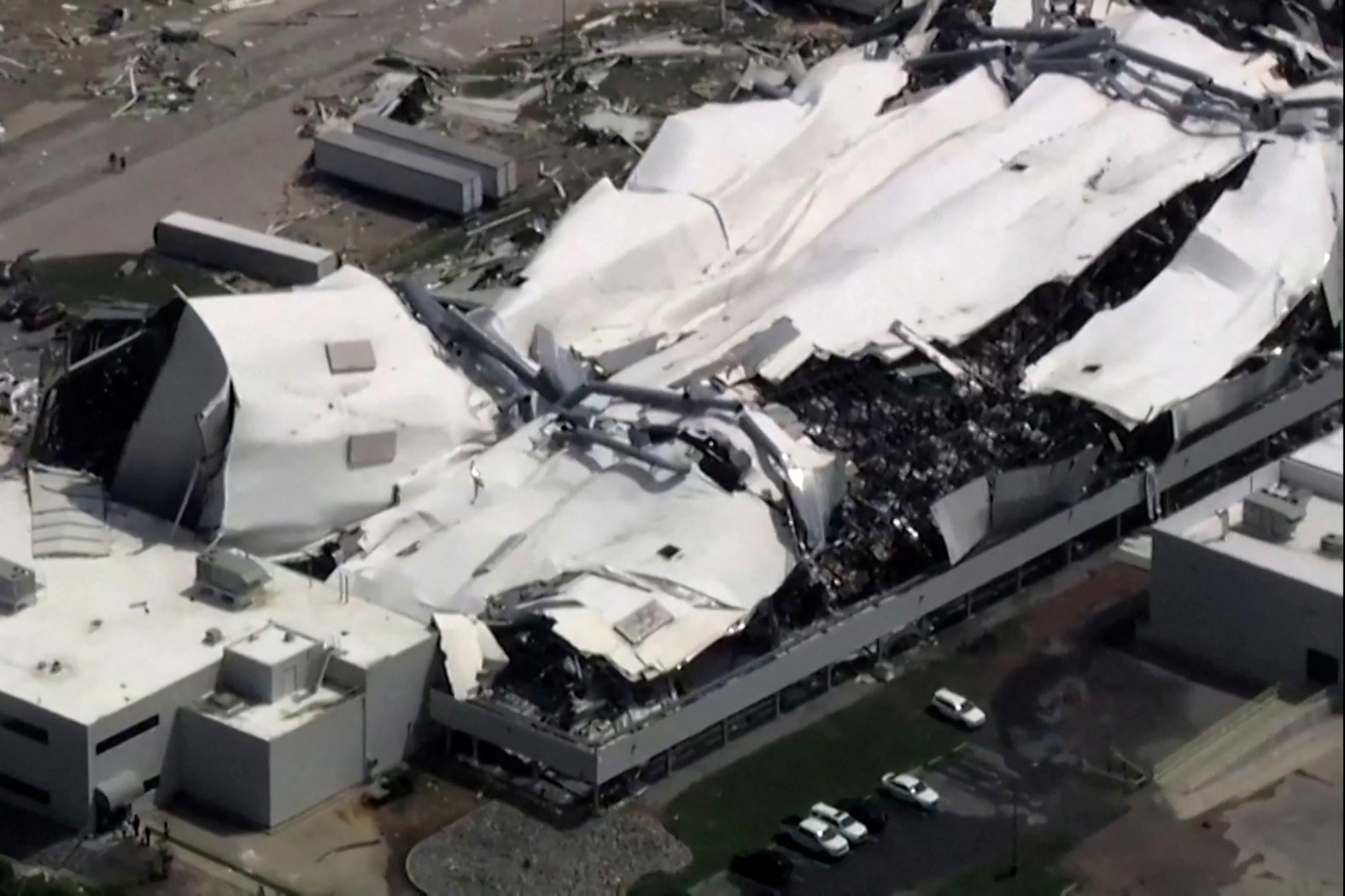 PHOTO: The roof of a Pfizer facility shows heavy damage after a tornado passed the area in Rocky Mount, N.C., July 19, 2023.