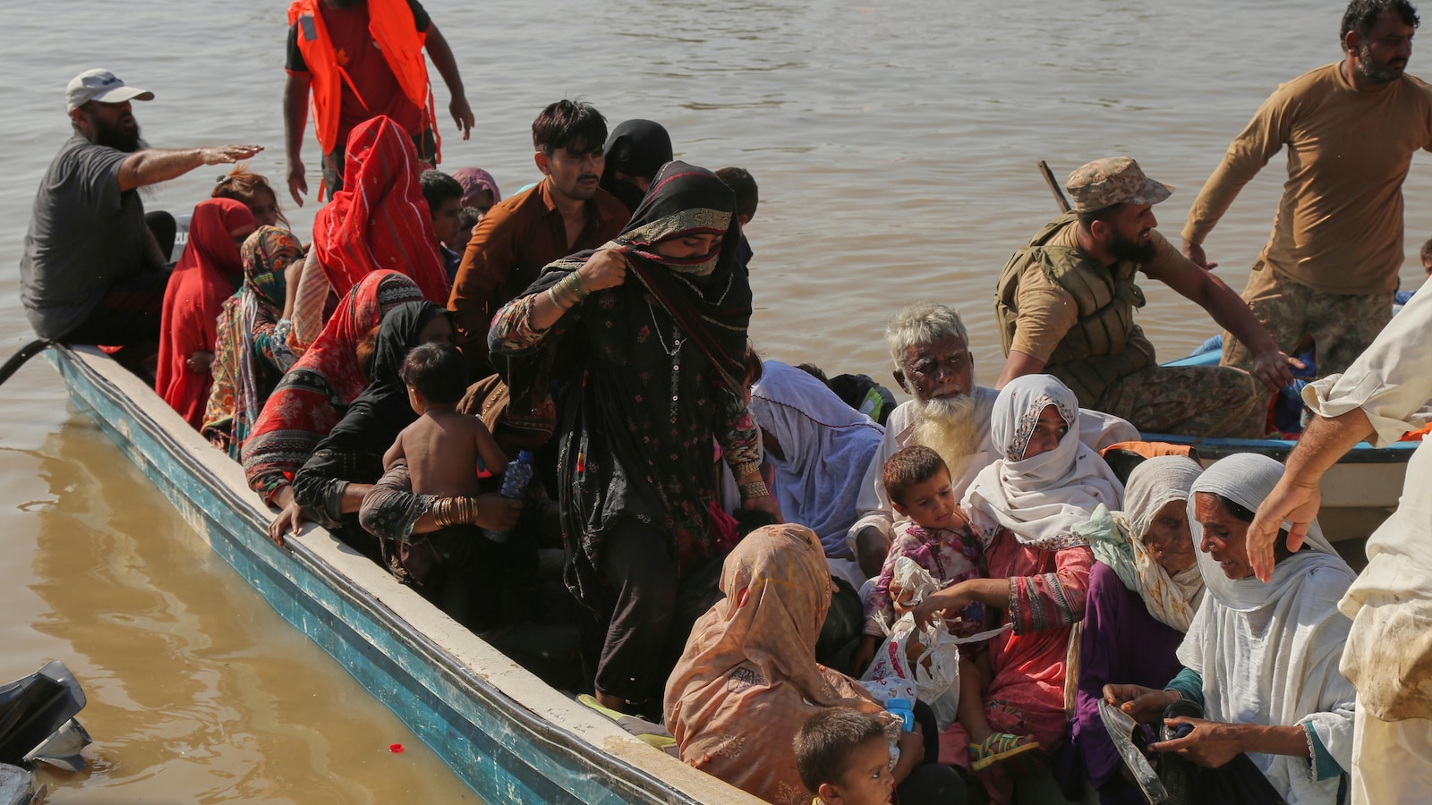 Rescue boat evacuating flood victims capsizes in eastern Pakistan, killing 9