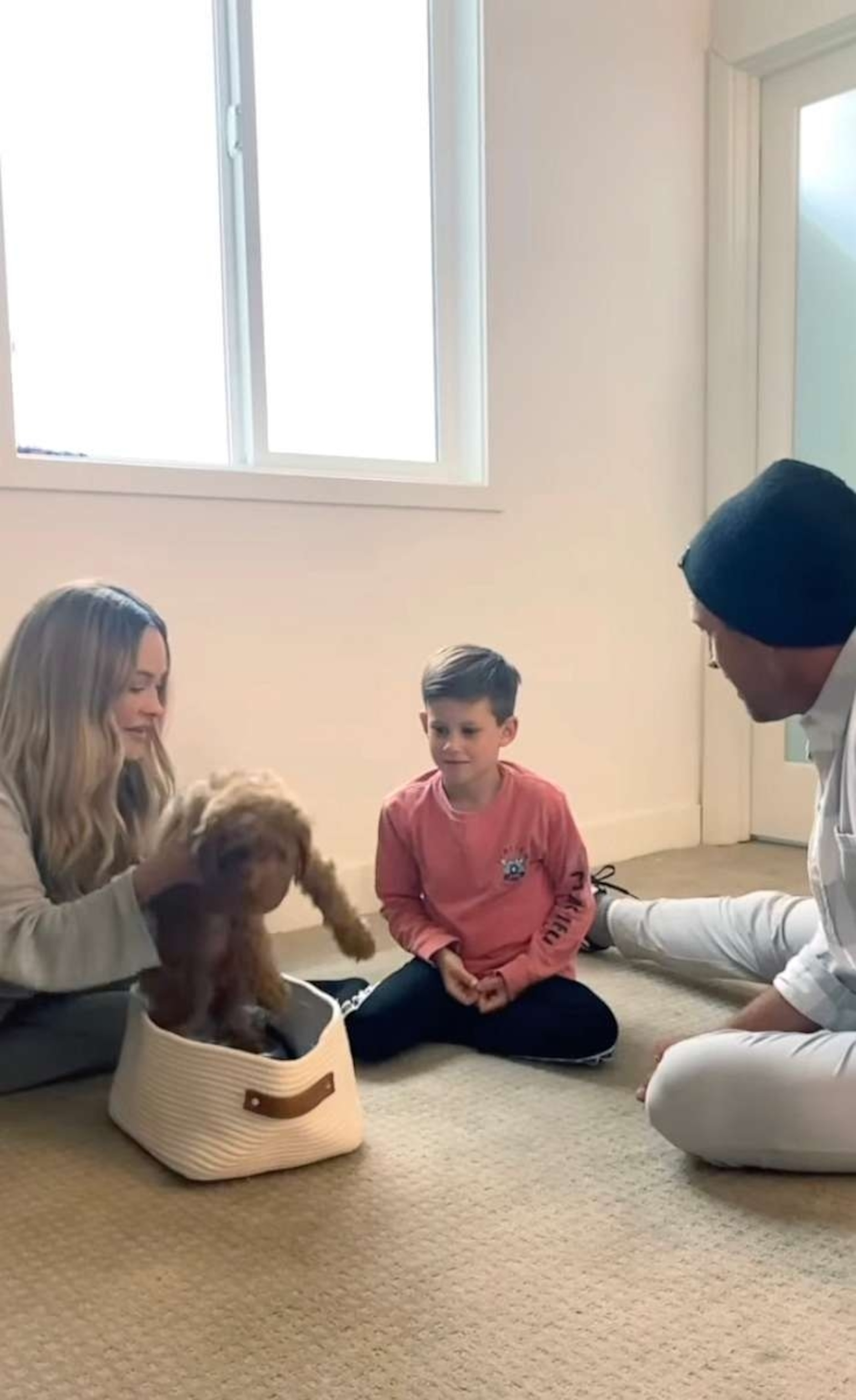 PHOTO: "Dancing with Stars" dancers Peta Murgatroyd and Maksim Chmerkovskiy introduce their son Shai to the new family puppy in a video posted to Instagram, April 13, 2023.