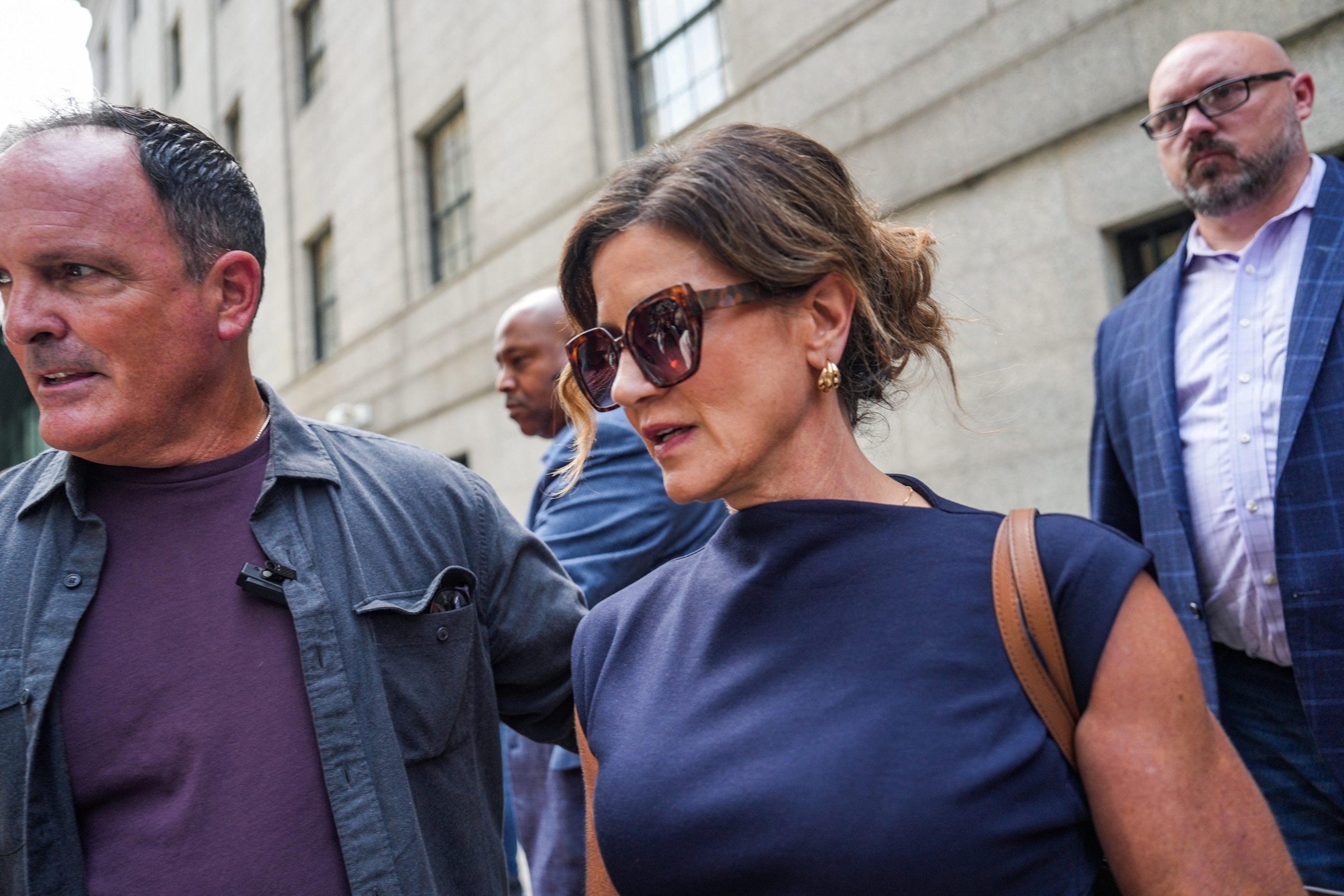 PHOTO: Paulette Thompson, wife of late UnitedHealthcare CEO Brian Thompson, walks outside Manhattan Criminal Court following a hearing in the federal murder trial of Luigi Mangione in New York City, August 14, 2026.
