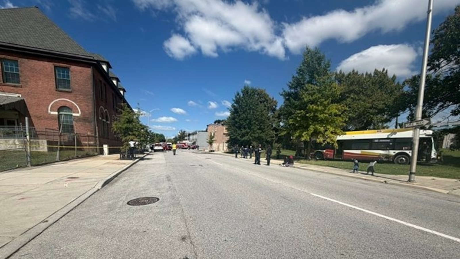 Over a dozen people were injured after an alleged stolen vehicle collided with a public bus in Baltimore, authorities said.