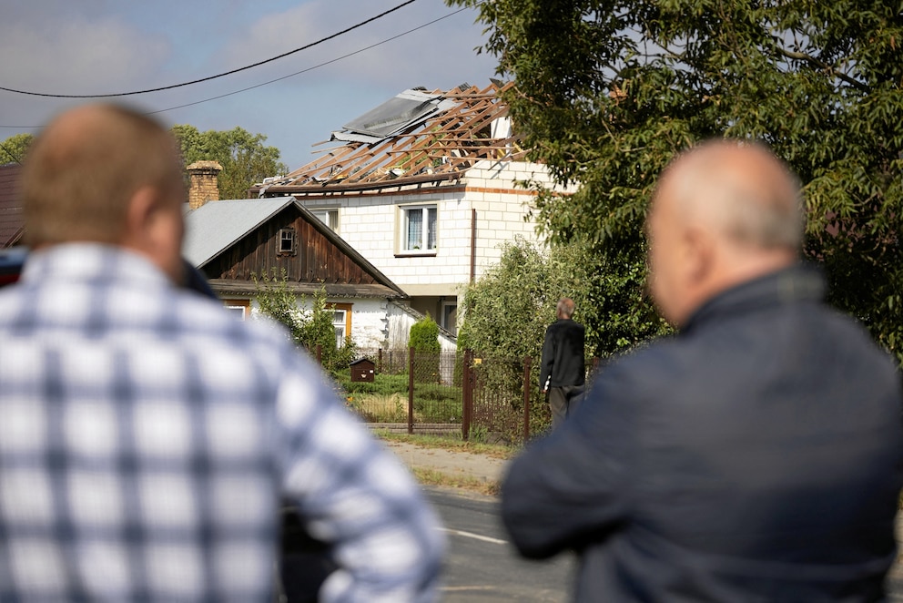 PHOTO: People watch as a house is damaged after a drone or similar object struck a residential building according to local authorities, in Wyryki municipality, Poland September 10, 2025