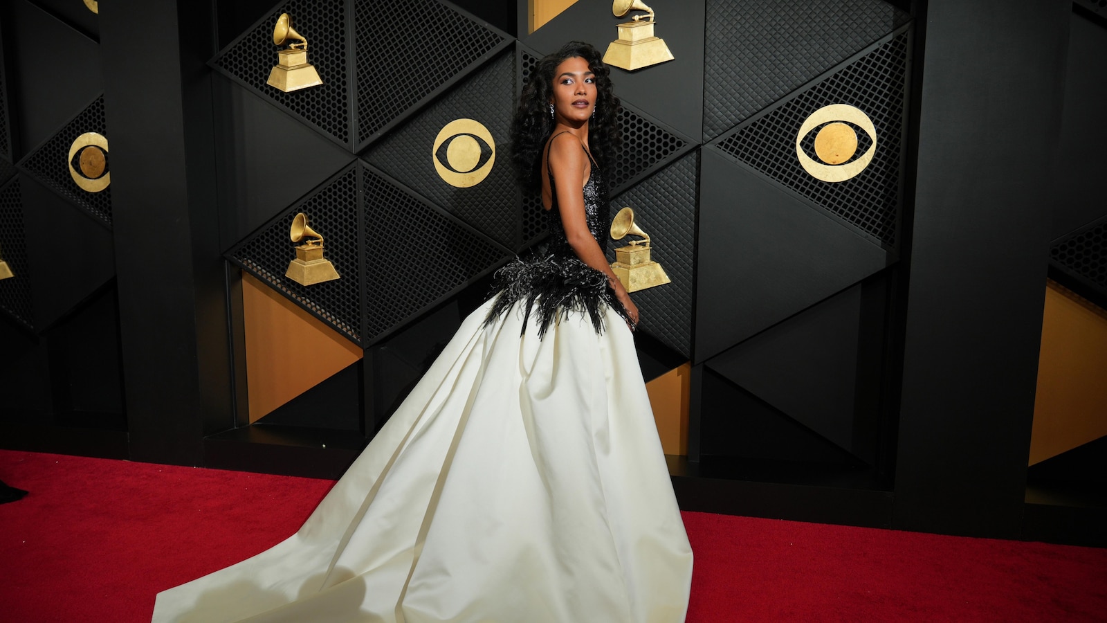 Addison Rae, Olivia Dean and other rising stars take up space on Grammys red carpet