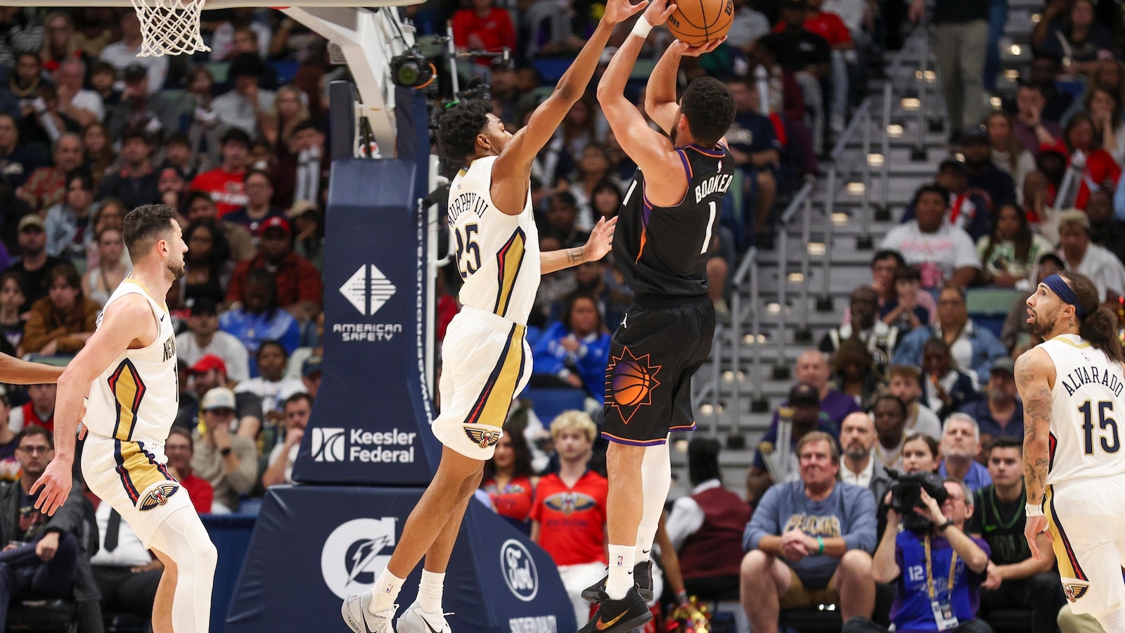 Booker scores 30 points and leads the Suns past the Pelicans, 115-108