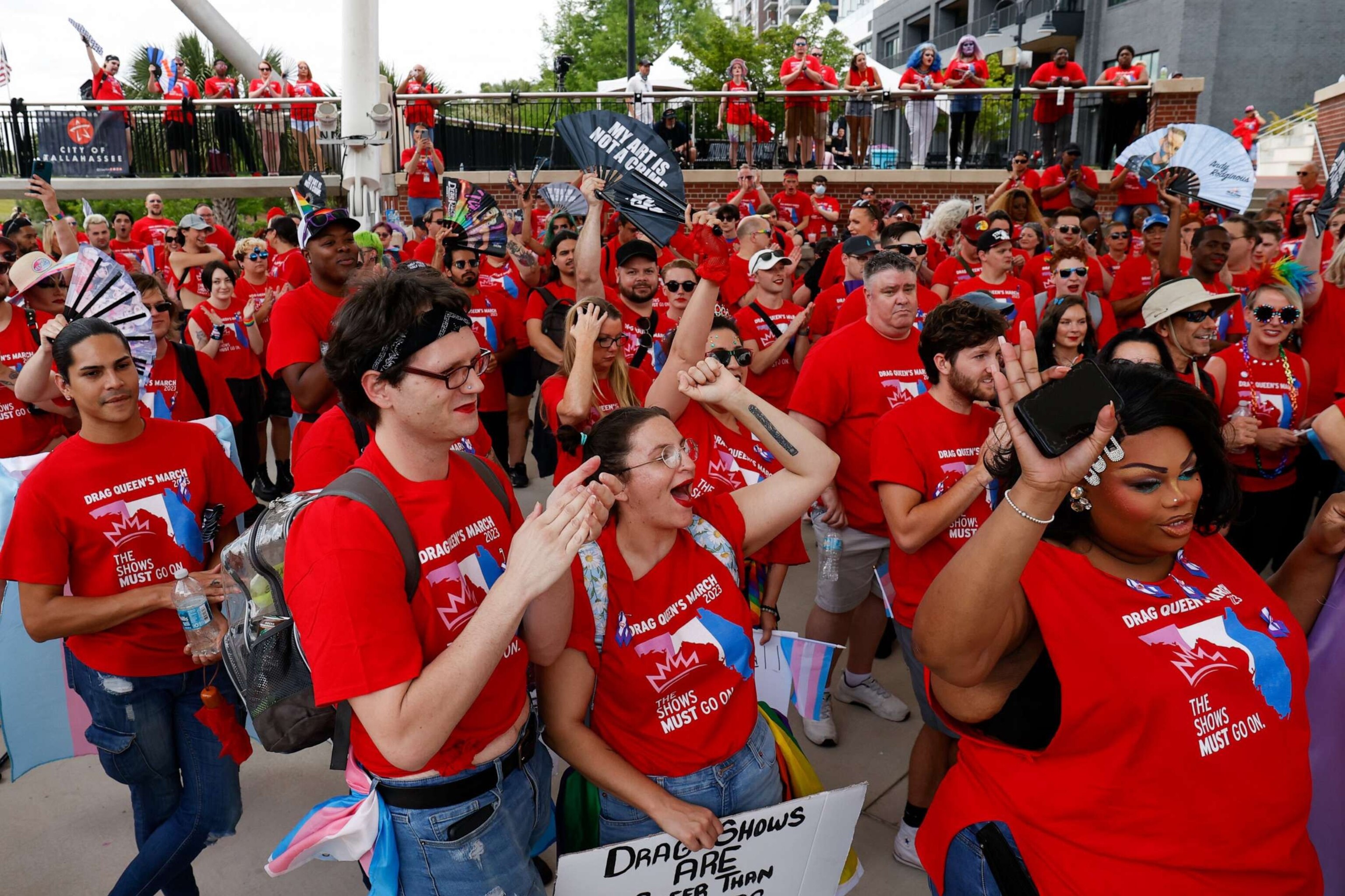 PHOTO: People cheer when speeches are given during the Drag Queen's March at Cascades Park, on April 25, 2023, in Tallahassee, Fla.