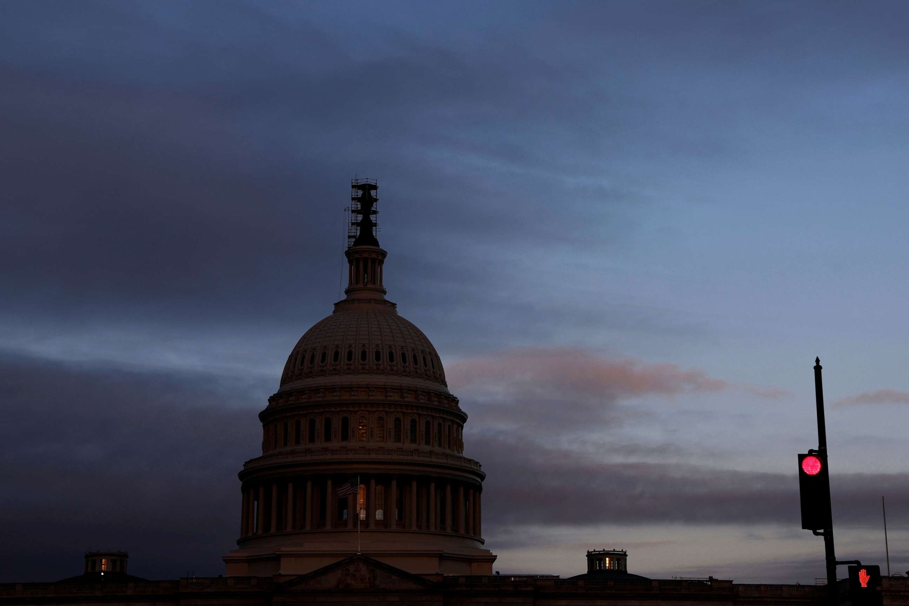 PHOTO: The morning sky brightens over the U.S. Capitol in Washington, September 28, 2023.