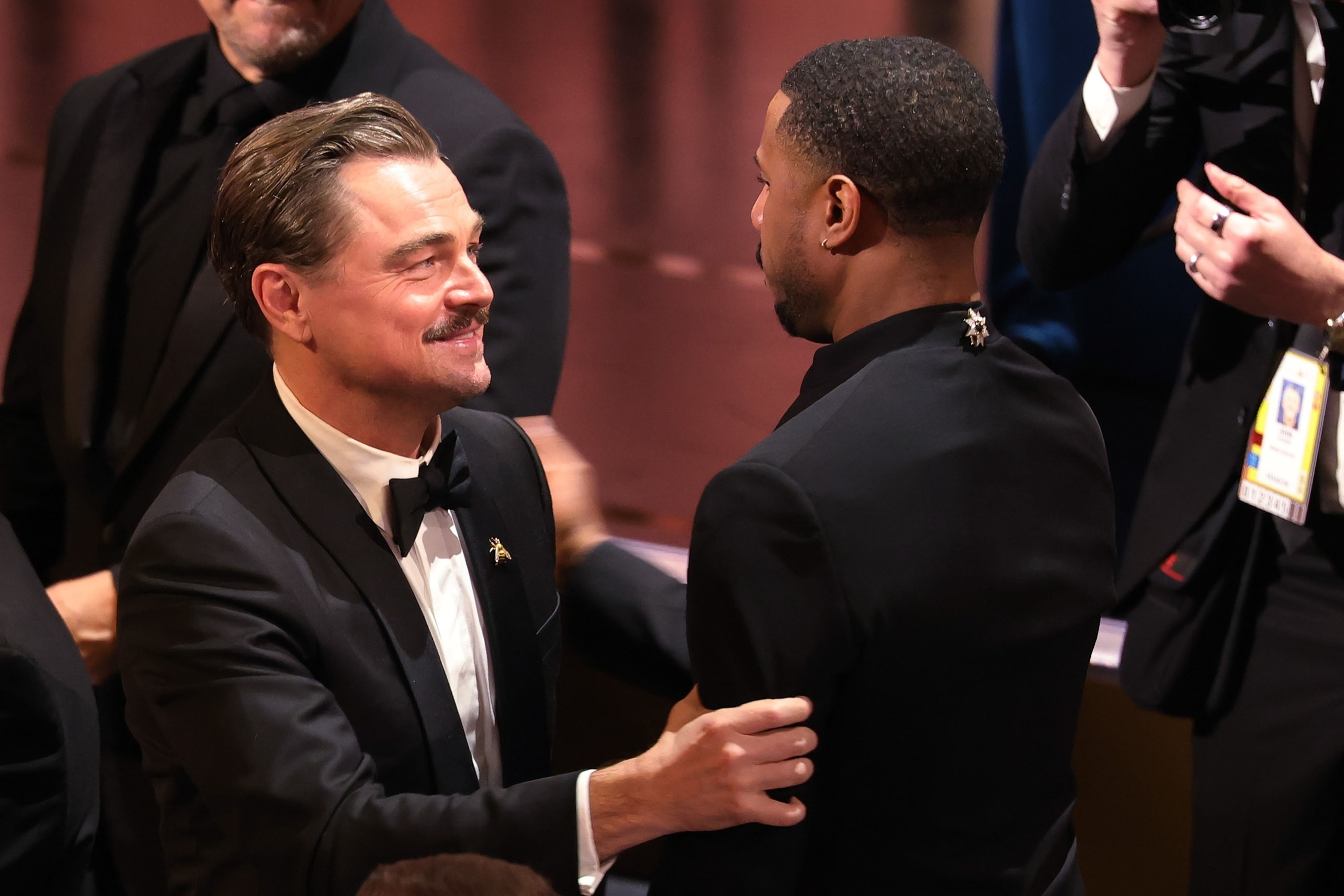 Michael B. Jordan and Leonardo DiCaprio embrace after Jordan's Oscar win - ABC News