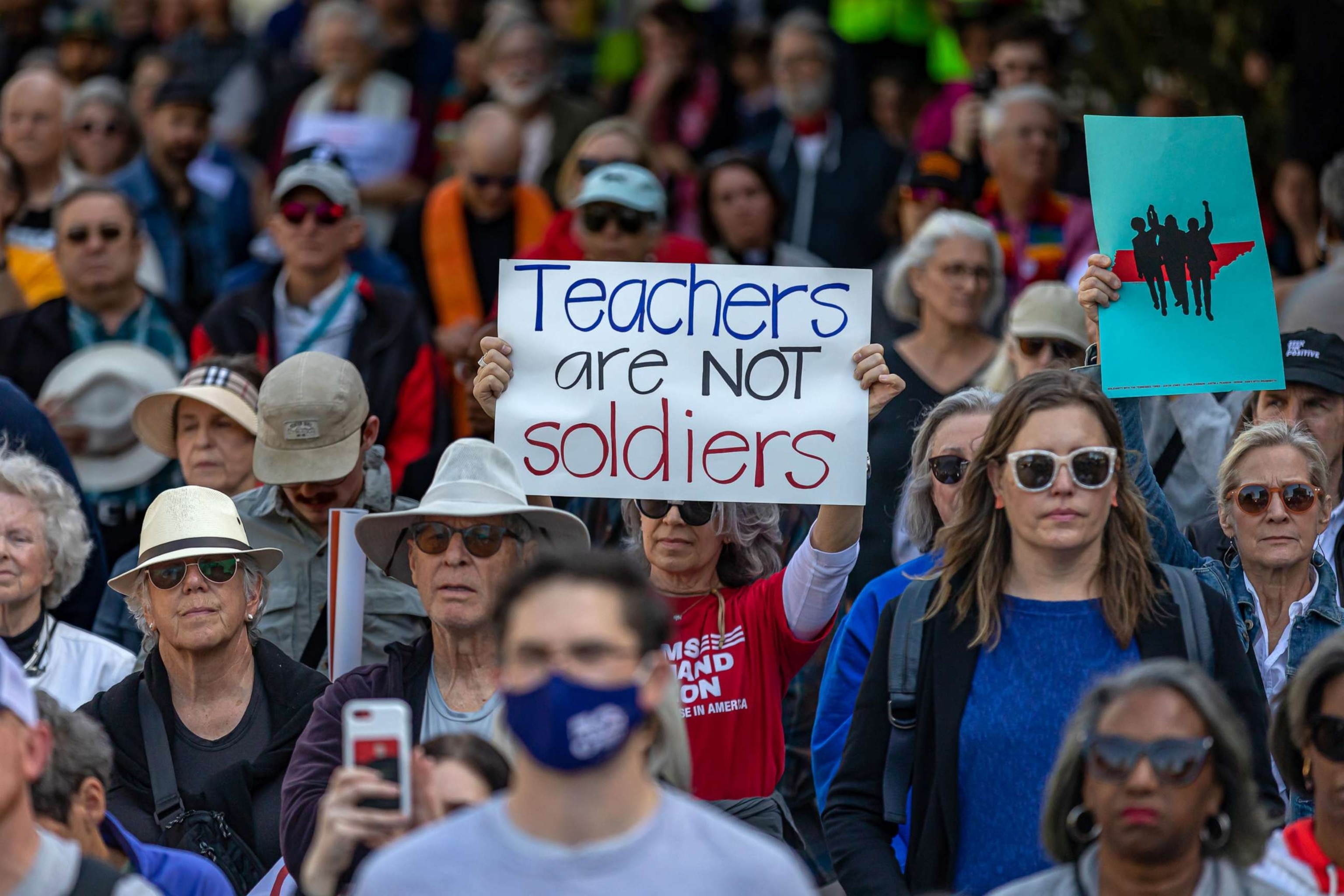 PHOTO: In this April 17, 2023, file photo, a gun safety advocate holds a sign outside of the Tennessee Capitol during a "Moral Monday" rally to address gun violence, in Nashville, Tenn.