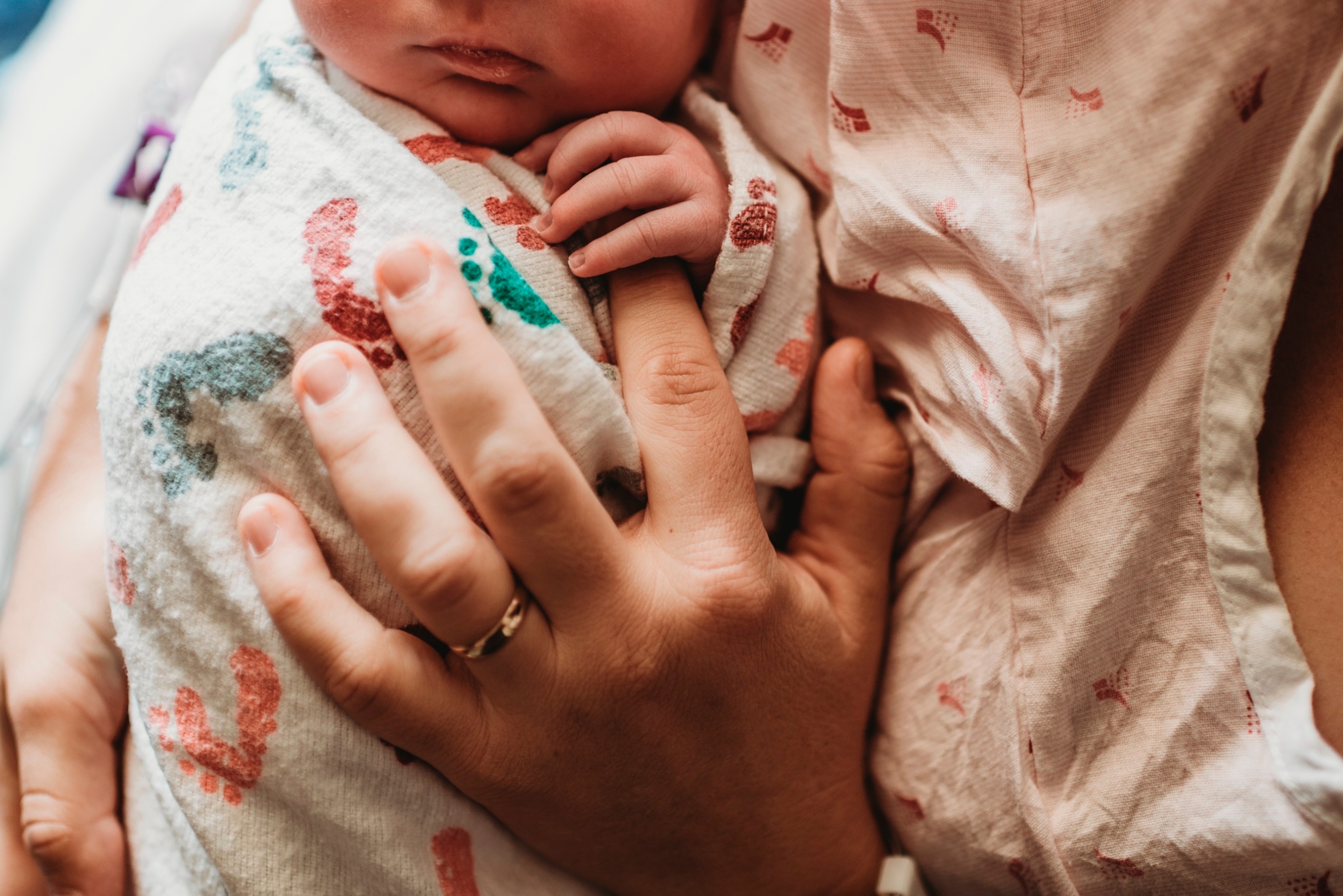 PHOTO: A mom holds a newborn baby in an undated stock photo.