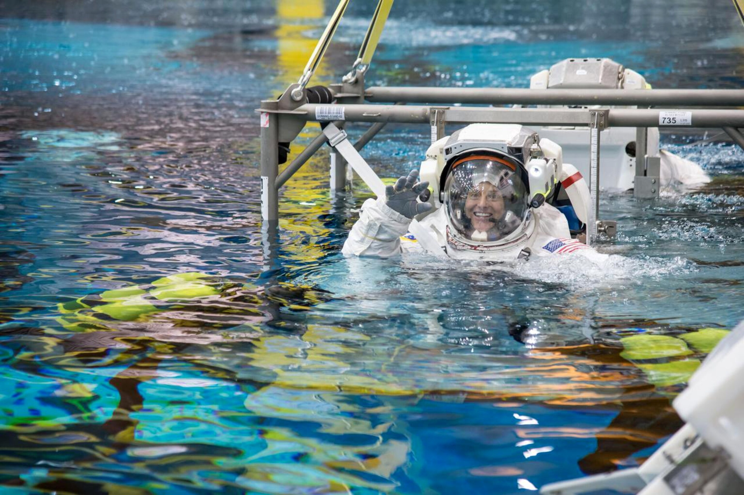 PHOTO: Nicole Mann being lowered into the Neutral Buoyancy Laboratory during a spacewalk training session.