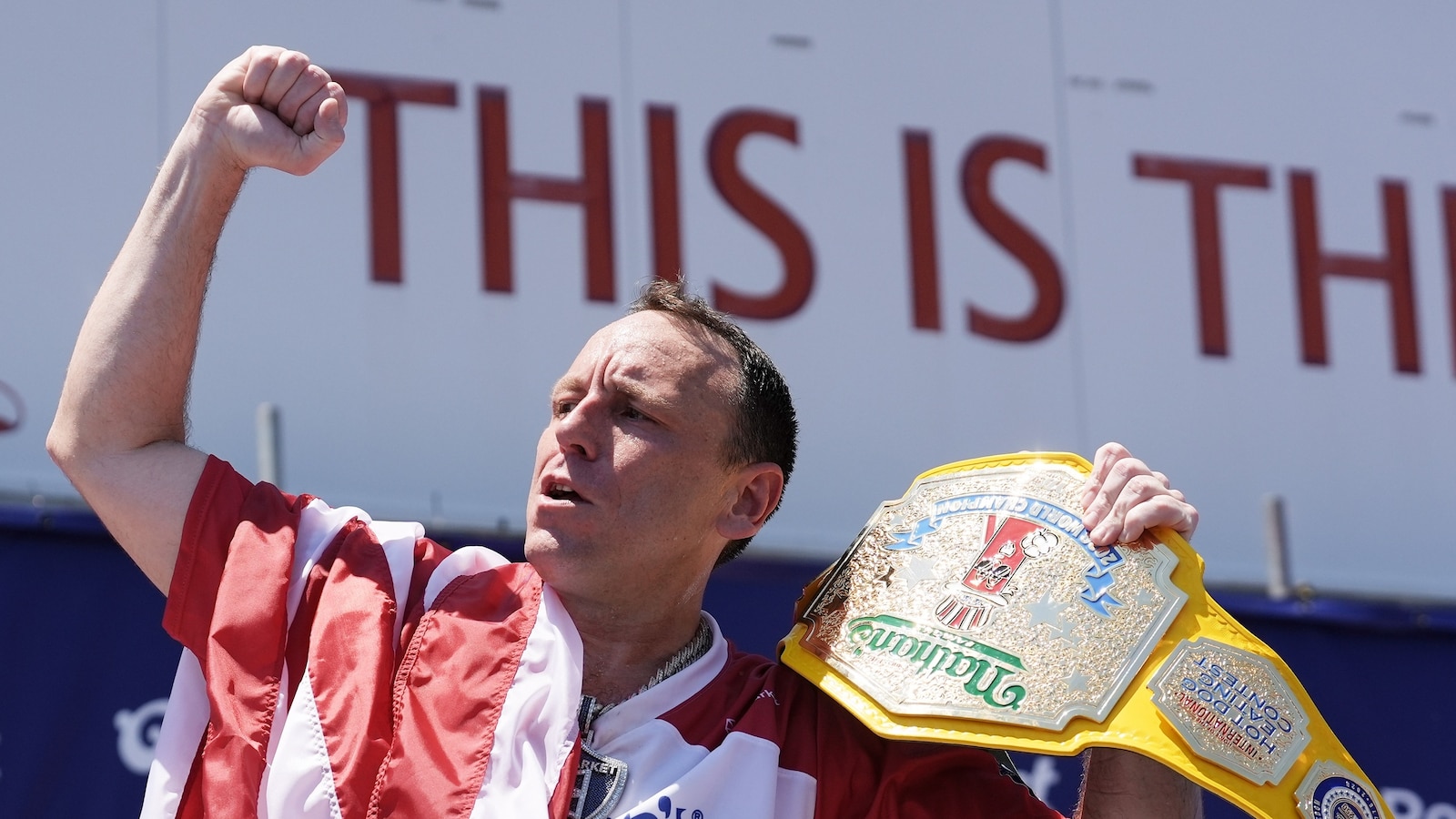 Joey Chestnut celebrating his 18th Nathan’s Famous contest victory