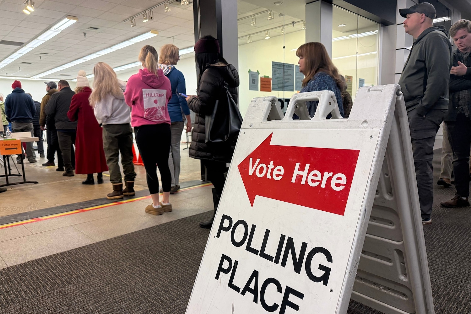 Voters stand in line at an early voting location in a mall in Anchorage, Alaska, Oct. 21, 2026. Haven Daley/AP Photo