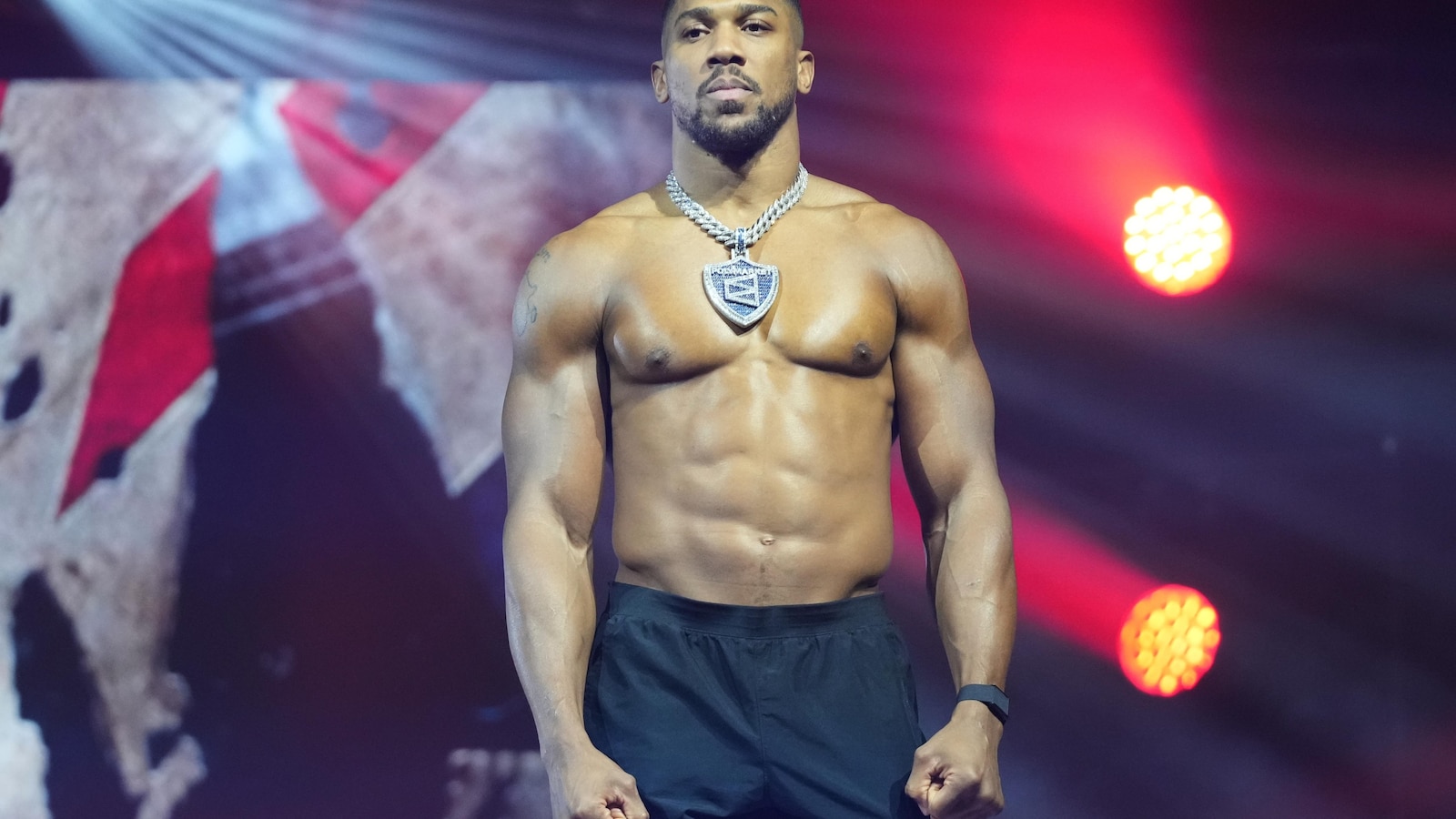 Anthony Joshua returns to Britain after car crash that killed two friends in Nigeria Anthony Joshua returns to Britain after car crash that killed two friends in Nigeria