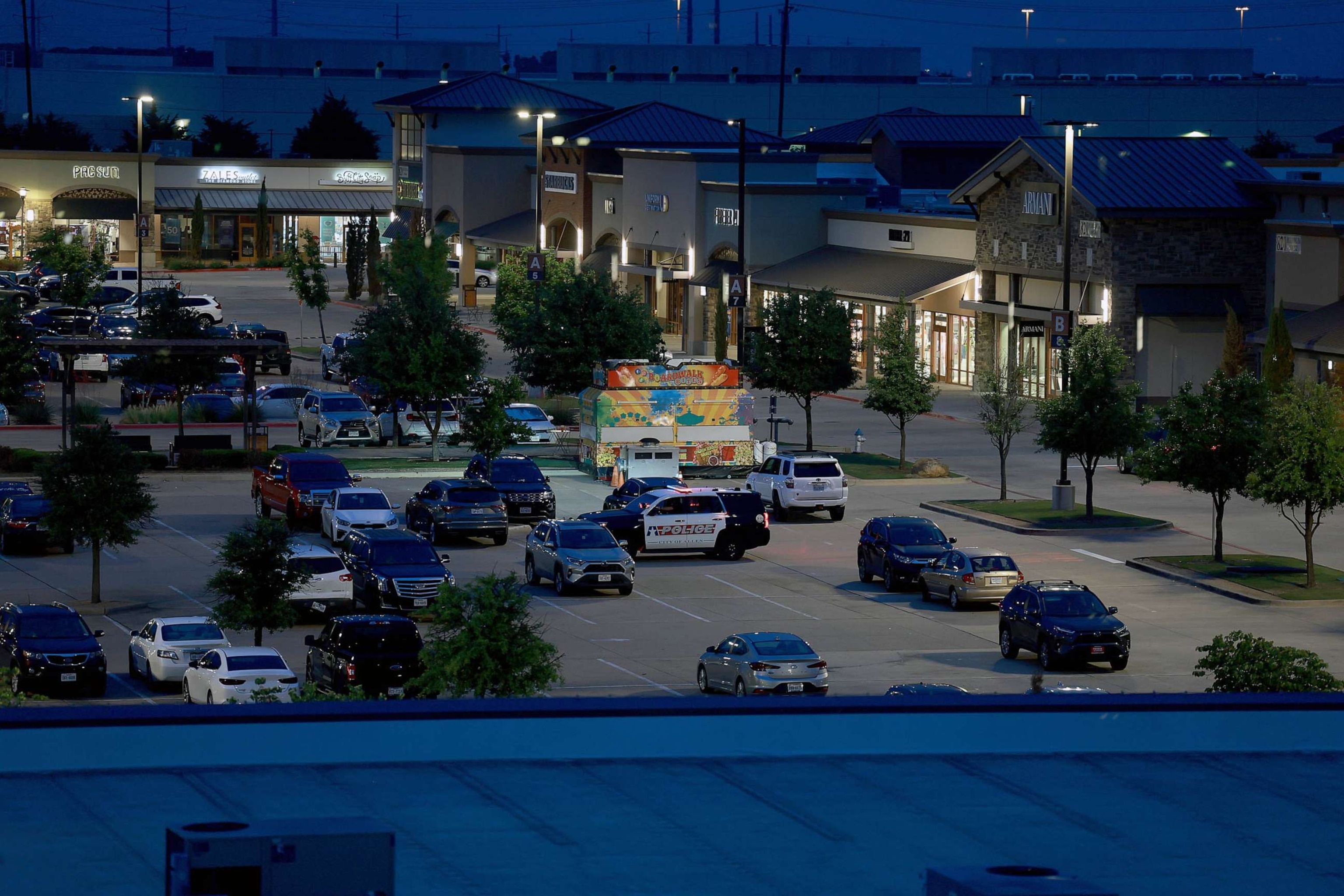 PHOTO: Cars are still in the parking lot of the Allen Premium Outlets mall, May 7, 2023 in Allen, Texas.