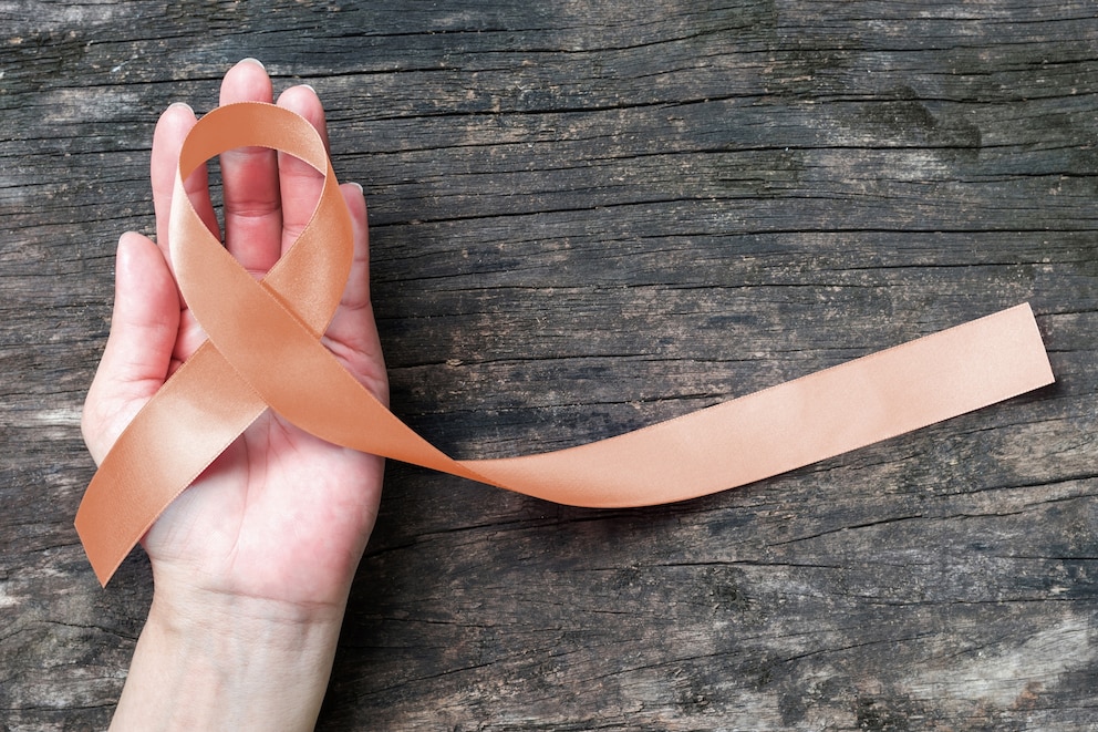 PHOTO: Gynecologic Cancer Awareness with peach color ribbon