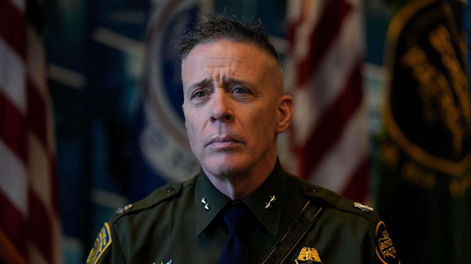 Border Patrol commander admitted he lied about tear gas incident, judge says, as she restricts use of force by immigration agents in Chicago