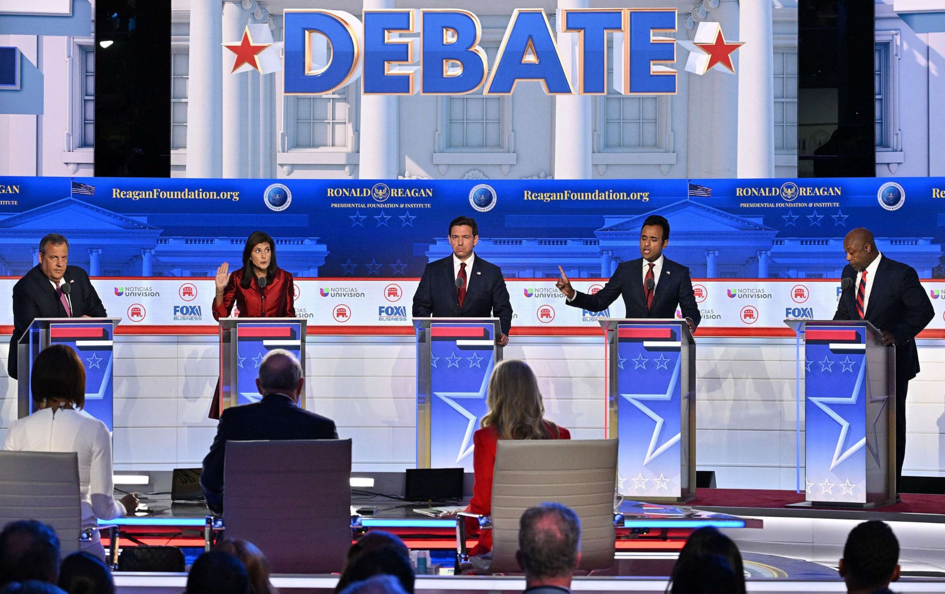 PHOTO: In this Sept. 27, 2023, file photo, Chris Christie, Fla. Gov. Ron DeSantis, and Sen. Tim Scott look on as Nikki Haley and Vivek Ramaswamy speak during the second Republican presidential primary debate in Simi Valley, Calif.