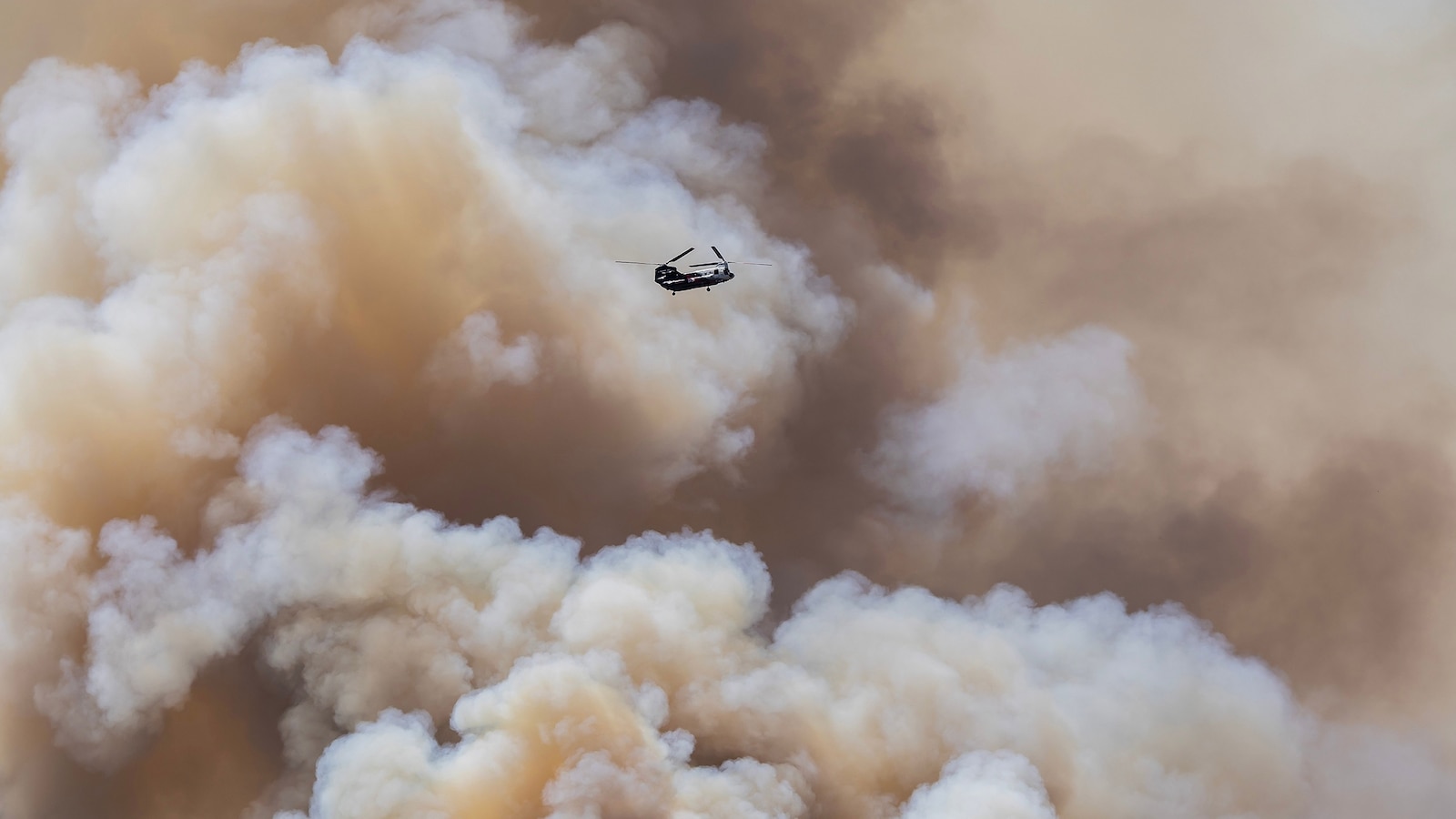 Multiple large wildfires menacing Southern California, prompting thousands ...