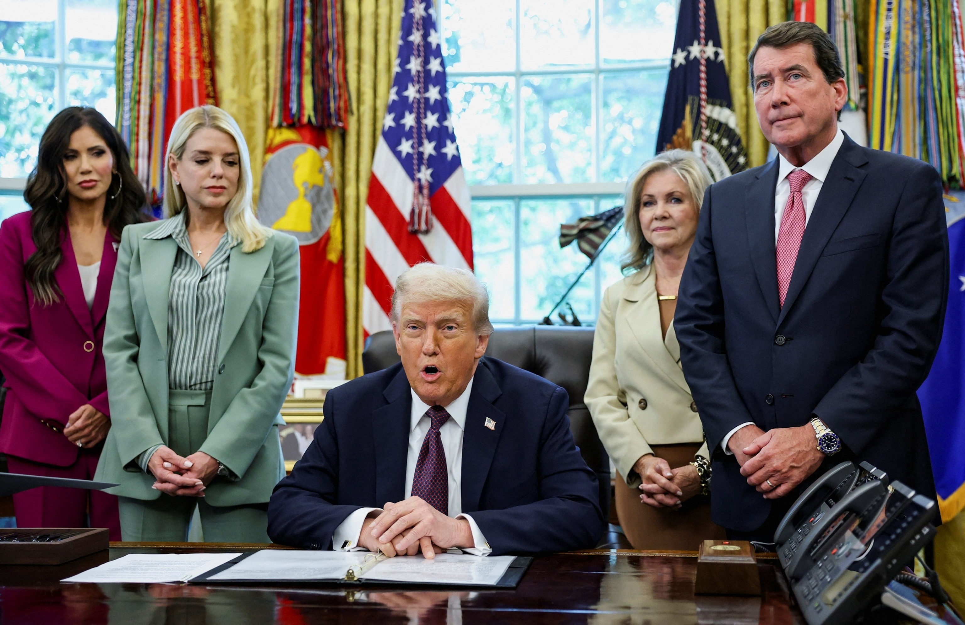 PHOTO: President Donald Trump, accompanied by Homeland Security Secretary Kristi Noem, Attorney General Pam Bondi, Tennessee Senators Marsha Blackburn and Bill Hagerty, speaks during an event in the Oval Office in Washington, Sept. 15, 2025.
