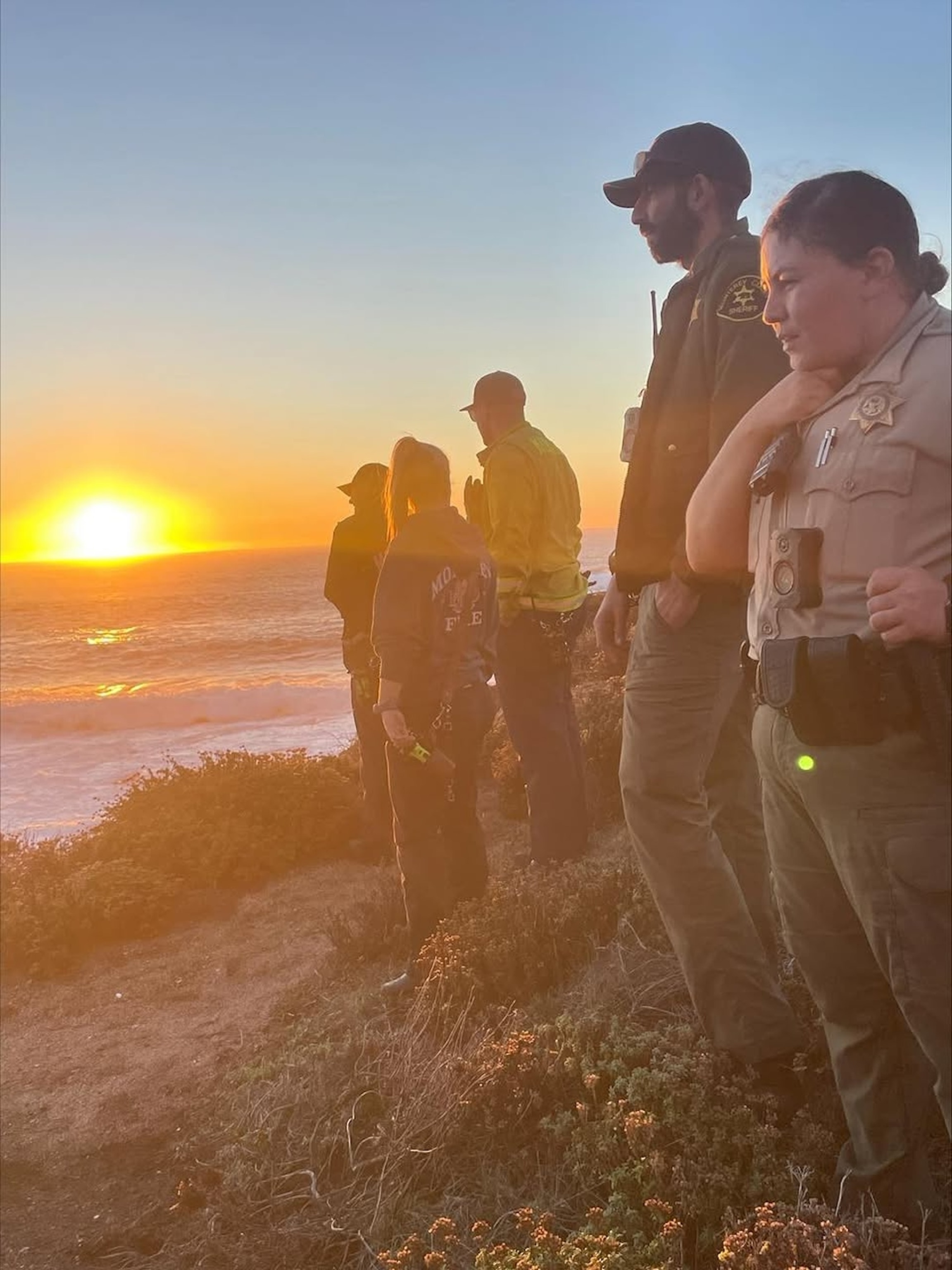 PHOTO: Monterey County, California, Sheriff's deputies scan the Pacific Ocean for a missing man who was swept into the water by a wave, November 22, 2025, at Garrapata State Park.