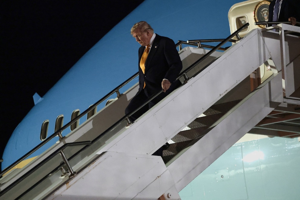 PHOTO: U.S. President Donald Trump boards the new, Qatari-gifted Air Force One after arriving on one of the older planes operating as Air Force One, to return to Washington, at RAF Mildenhall