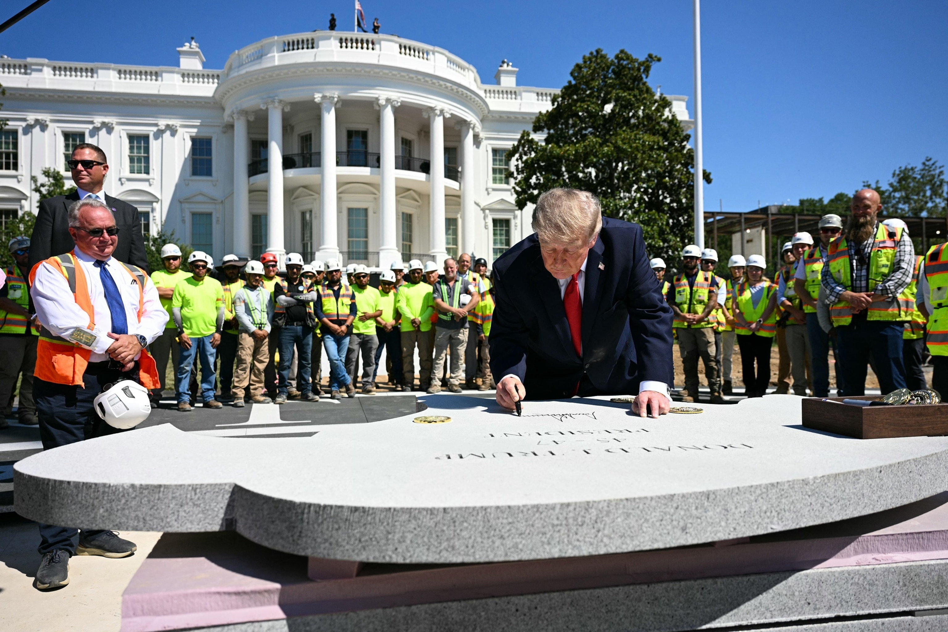  Trump shows off multimillion-dollar White House helipad and adds his signature