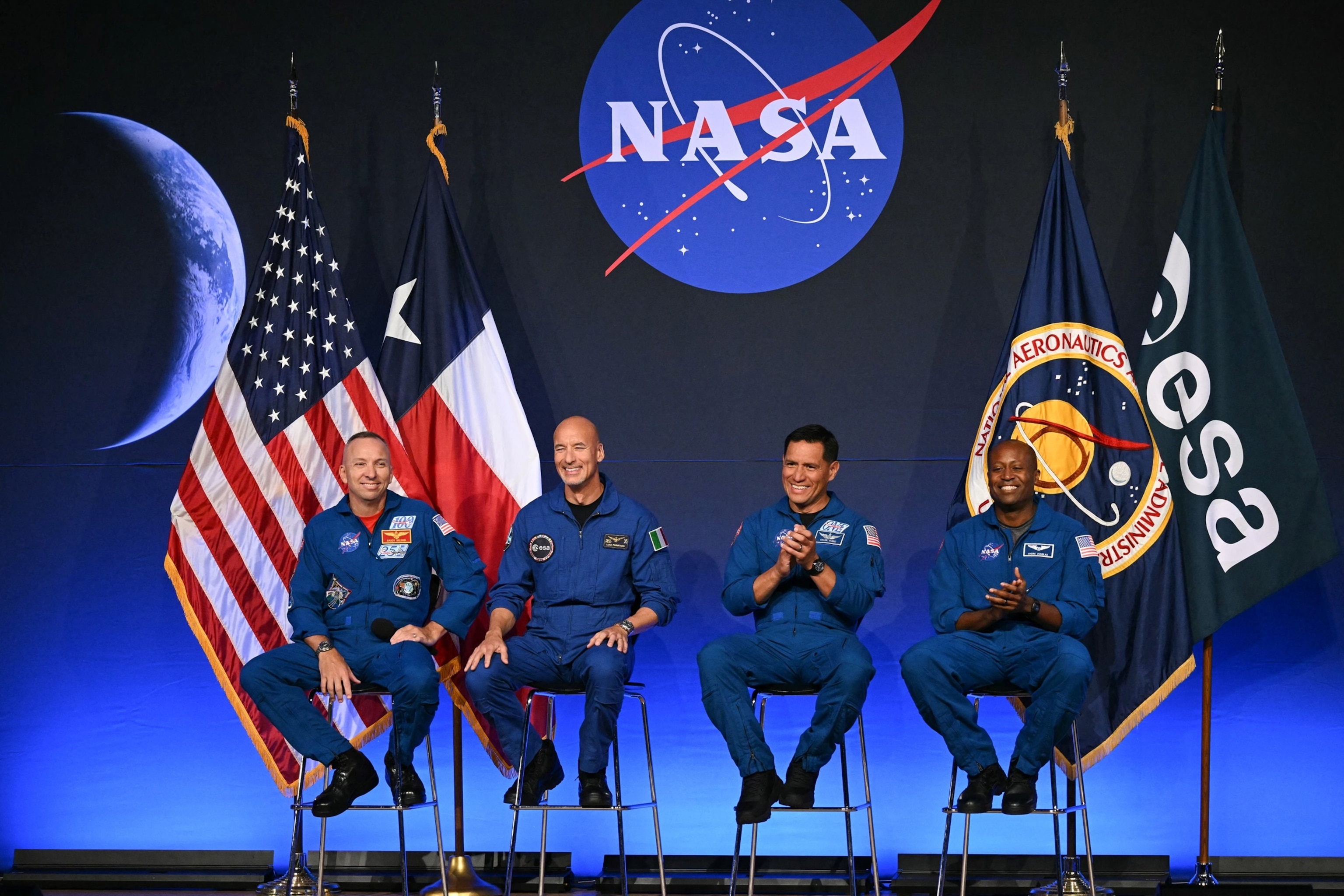 PHOTO: The Artemis III crew speak during a press conference announcing the crew for the Artemis III mission at NASA's Johnson Space Center in Houston, Texas, June 9, 2026. 