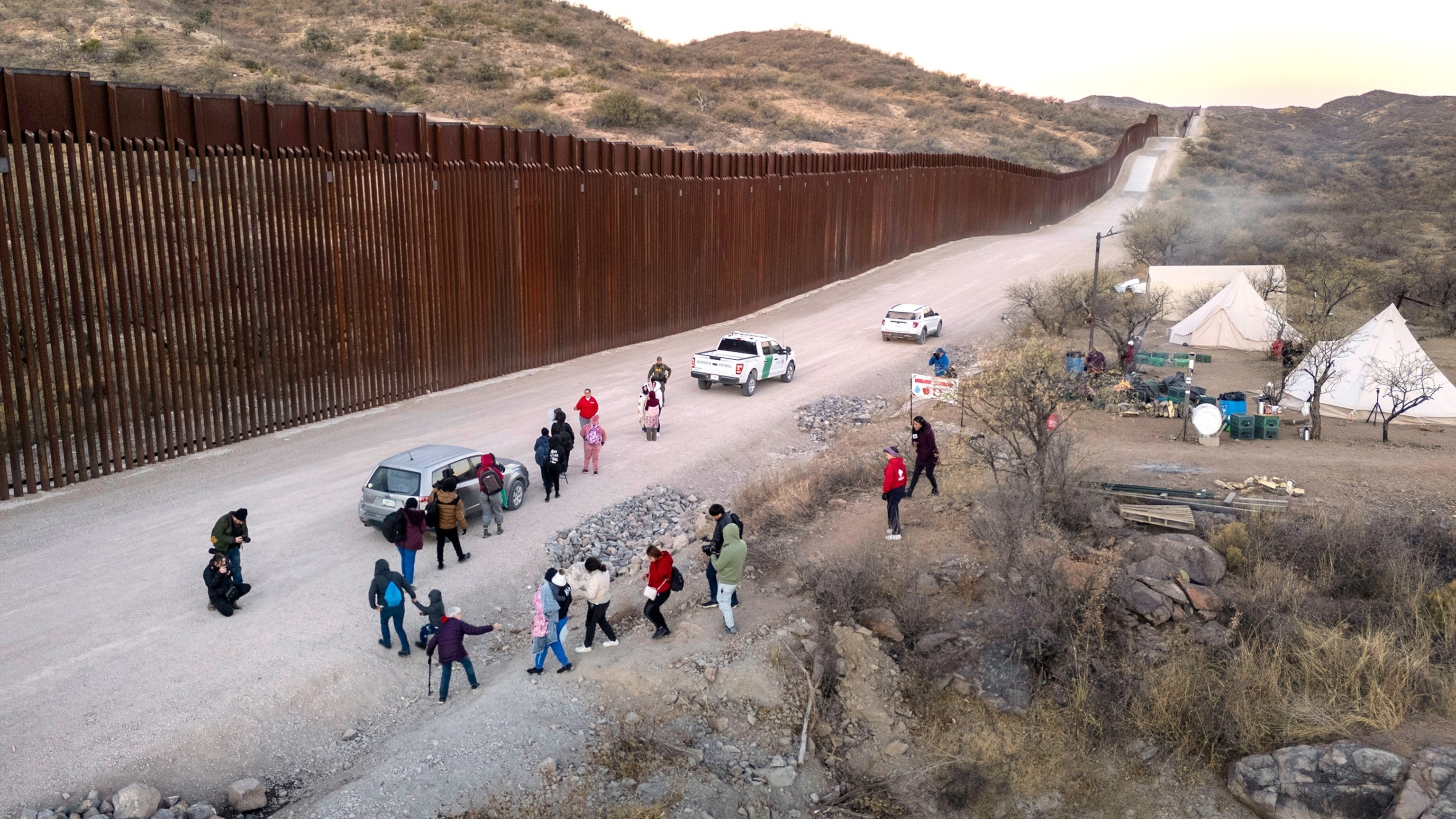 PHOTO: In this Jan. 20, 2025, file photo, immigrants prepare to be transported by U.S. Border Patrol agents after crossing the U.S.-Mexico border near Sasabe, Arizona.