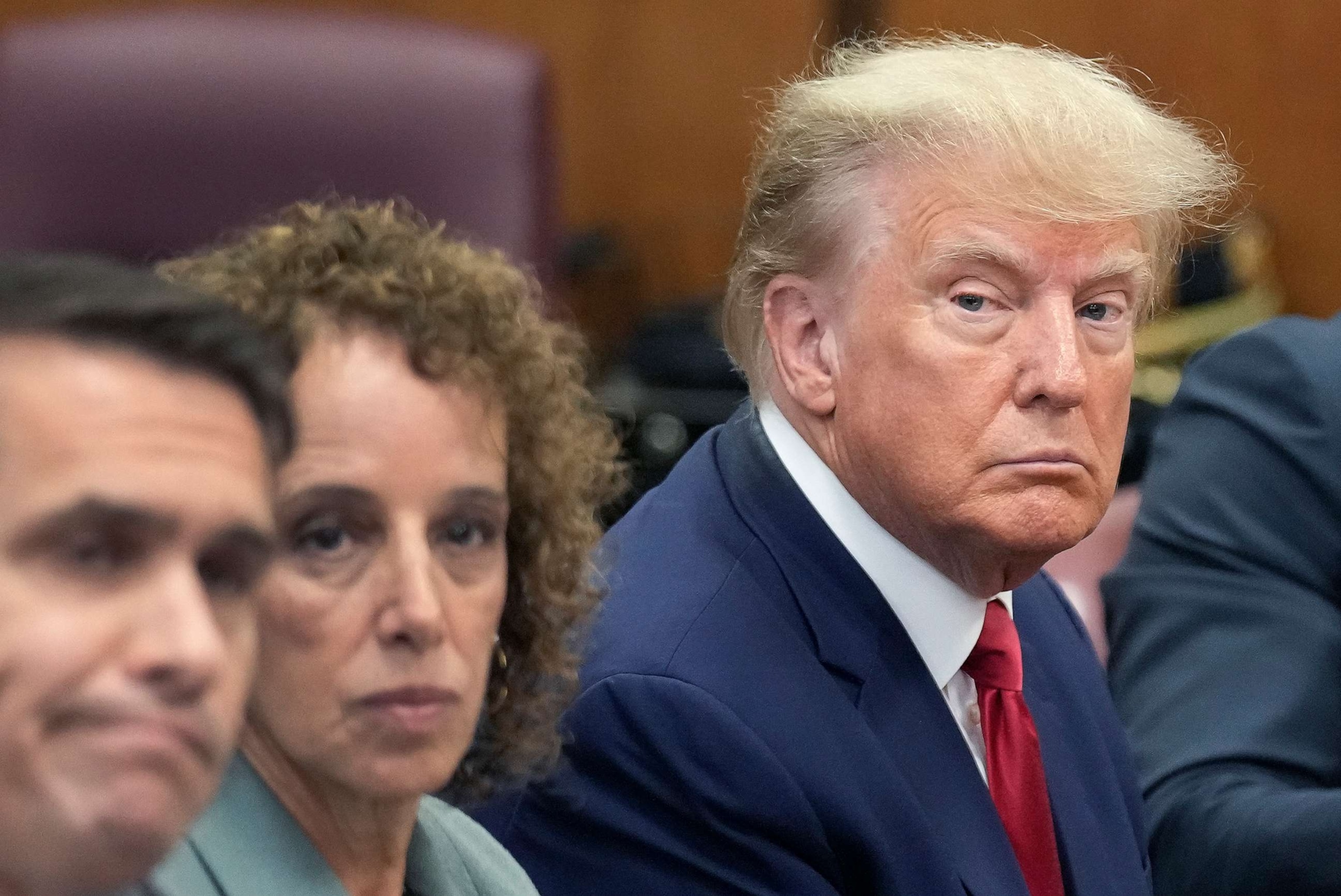 PHOTO: Former President Donald Trump sits at the defense table with his defense team in a Manhattan court, April 4, 2023, in New York.