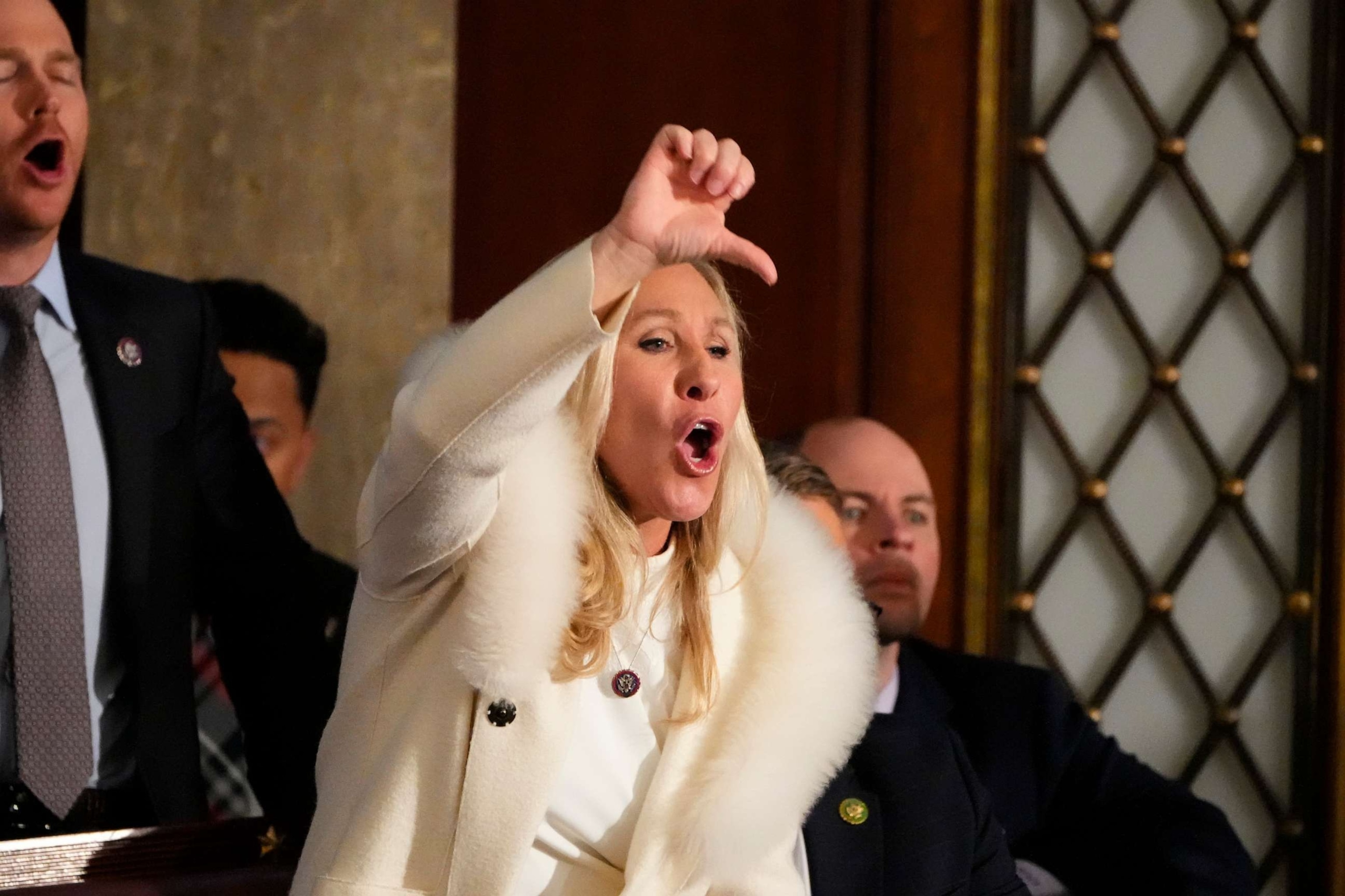 PHOTO: Rep. Marjorie Taylor Greene yells in the chamber as President Joe Biden speaks during the State of the Union address in Washington, Feb. 7, 2023.