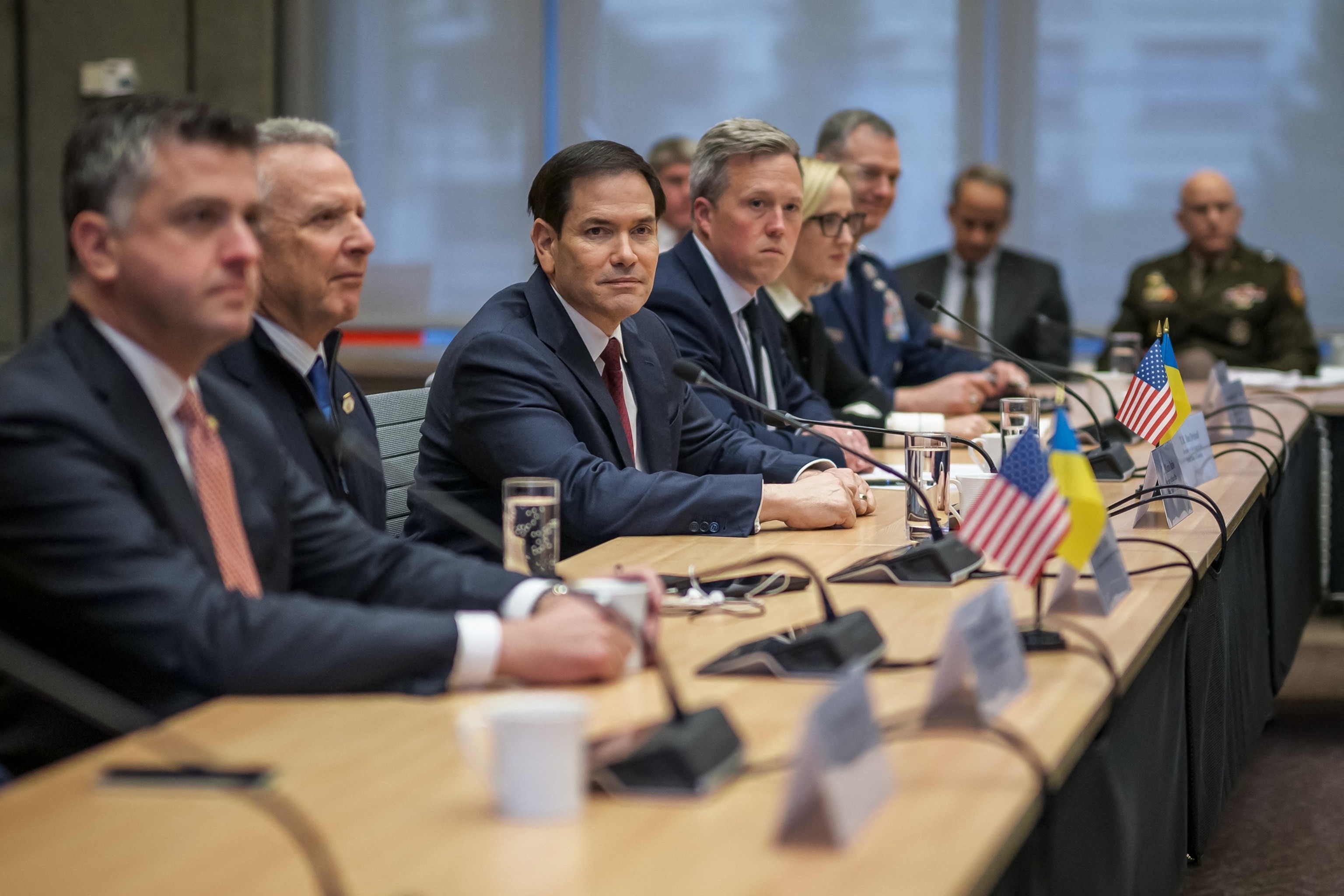 U.S. Secretary of State Marco Rubio (C), next to US special envoy Steve Witkoff (2nd L), faces the Ukrainian delegation during discussions on a U.S. plan to end the war in Ukraine at the U.S. Mission in Geneva, on Nov. 23, 2025.