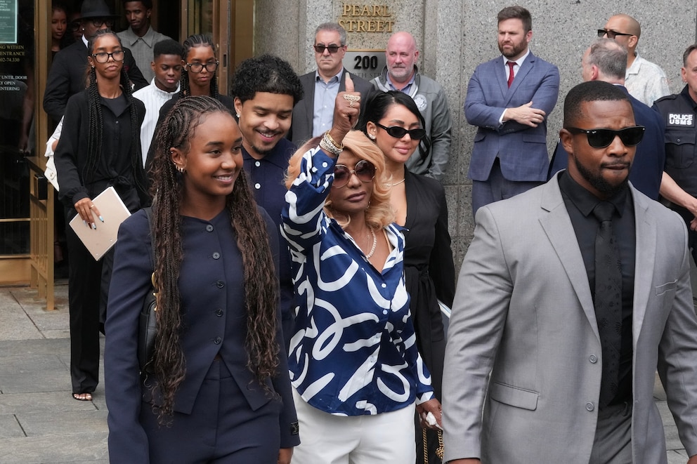PHOTO: Janice Combs mother of Sean "Diddy" Combs, gives a thumbs up as she departs with her children and family members at Manhattan's Federal Court as jury reached a full verdict in Sean "Diddy" Combs' trial, July 2, 2025, in New York City.