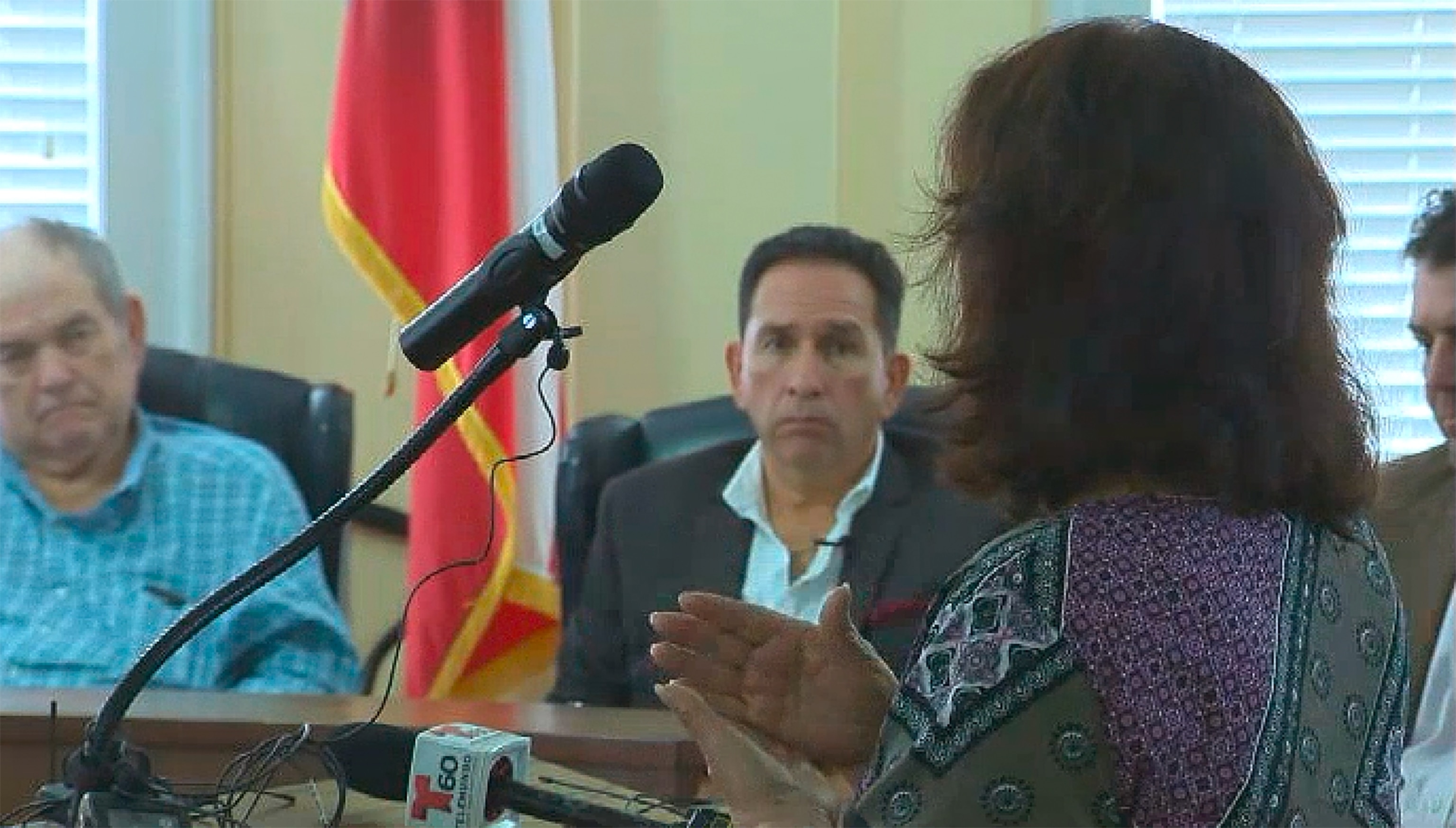 PHOTO: Mariano Pargas Jr. listens to a speaker address the Uvalde Commissioners Court, Dec. 12, 2022, in Uvalde, Texas.