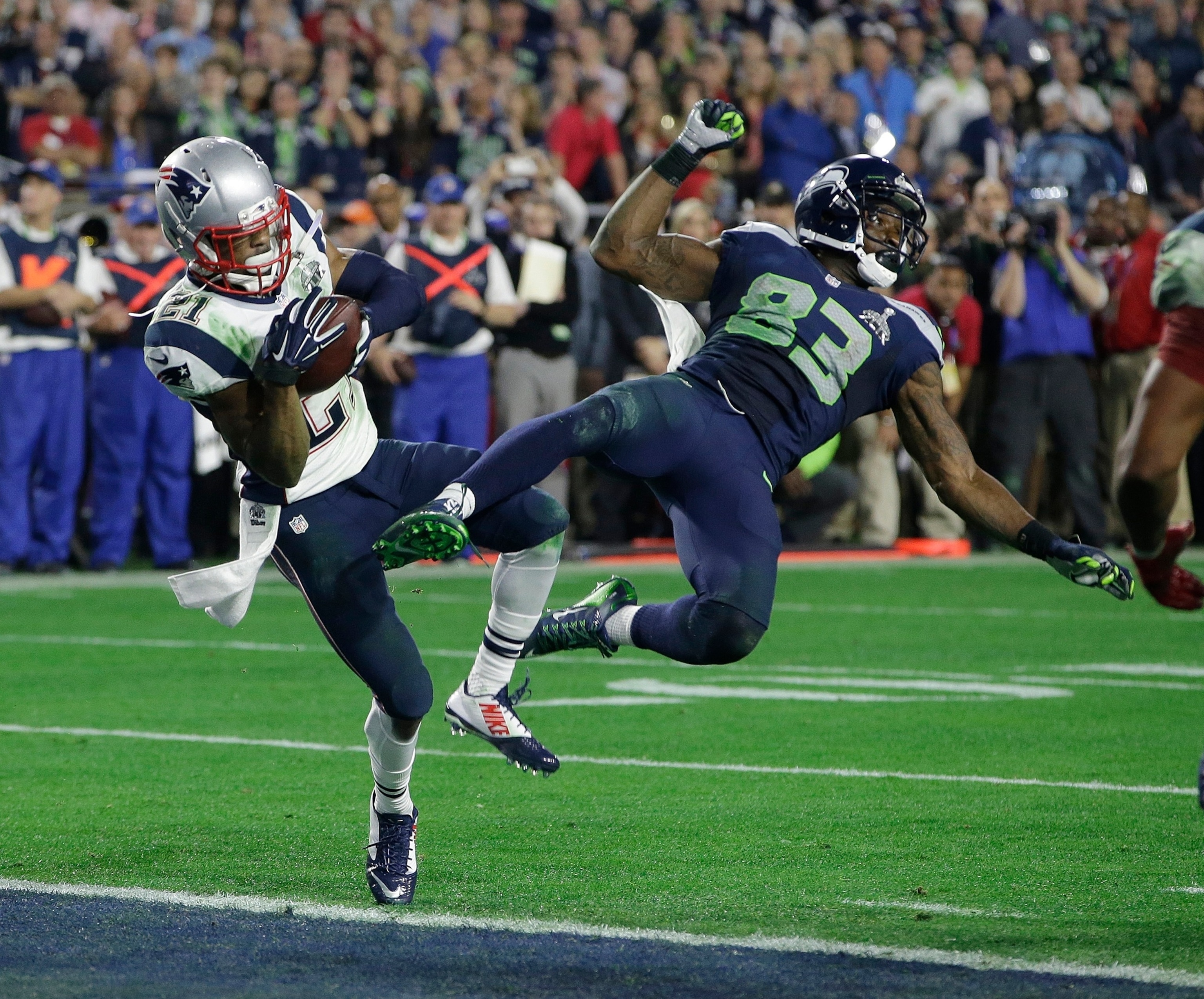 New England Patriots strong safety Malcolm Butler intercepts a pass intended for Seattle Seahawks wide receiver Ricardo Lockette in the final minute of Super Bowl 49 in Glendale, Ariz., Feb. 1, 2015. Kathy Willens/AP