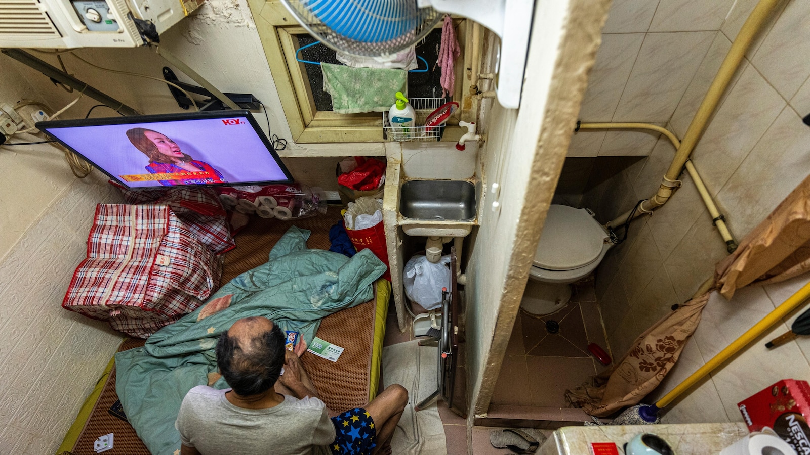 Hong Kong lawmakers pass bill to ban substandard tiny apartments