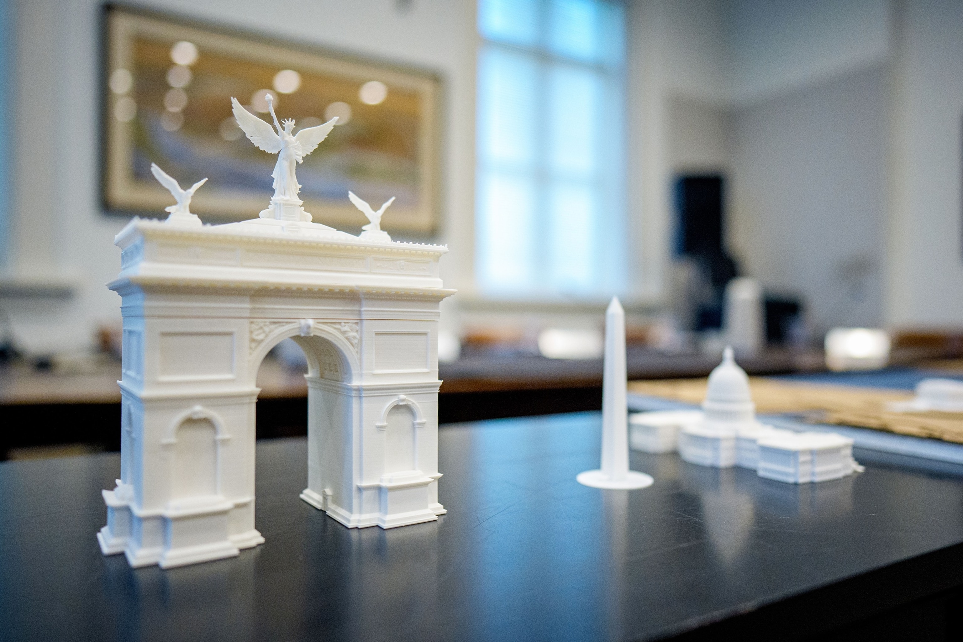 PHOTO: A model of President Donald Trump's proposed arch to commemorate the country's 250th anniversary is seen at a public meeting of the Commission of Fine Arts, April 16, 2026 in Washington.