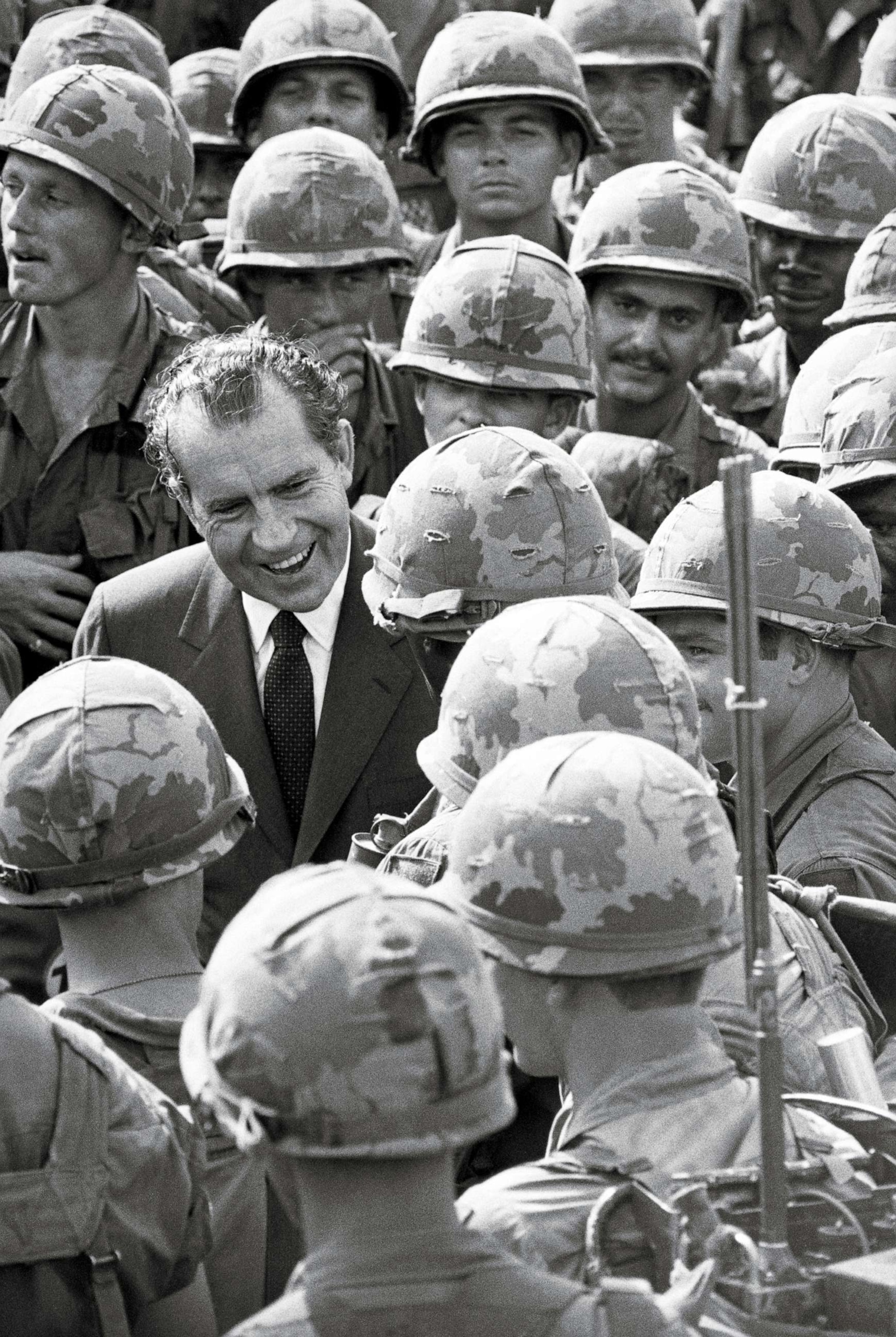 PHOTO: President Richard Nixon greets combat troops at the First Division base in Di An, ten miles northeast of Saigon, on July 30, 1969.The President spent five and a half hours in Vietnam, conferring with Saigon leaders and visiting troops.